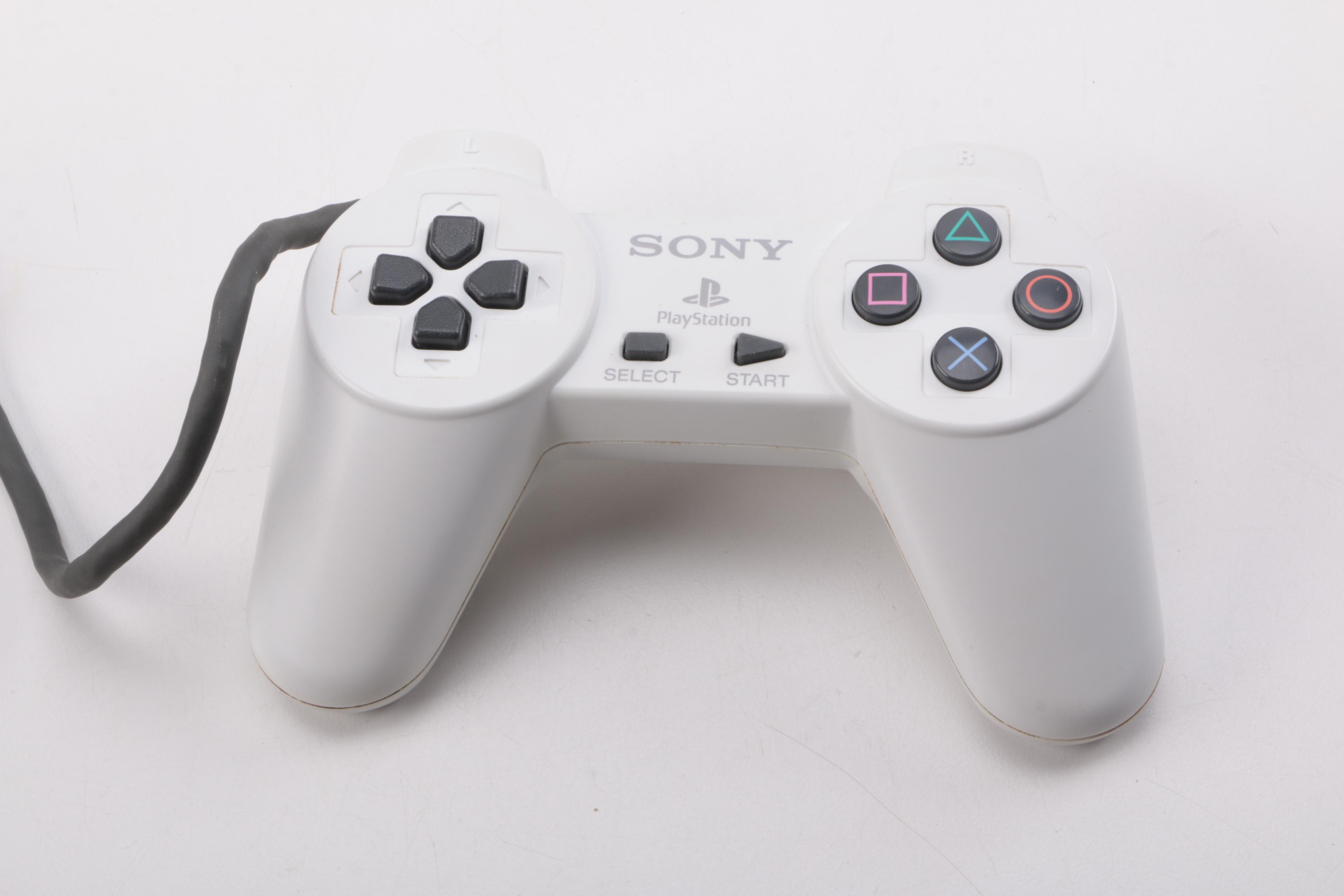 1990s Sony PlayStation SCPH-7001 with Mad Catz Accessories