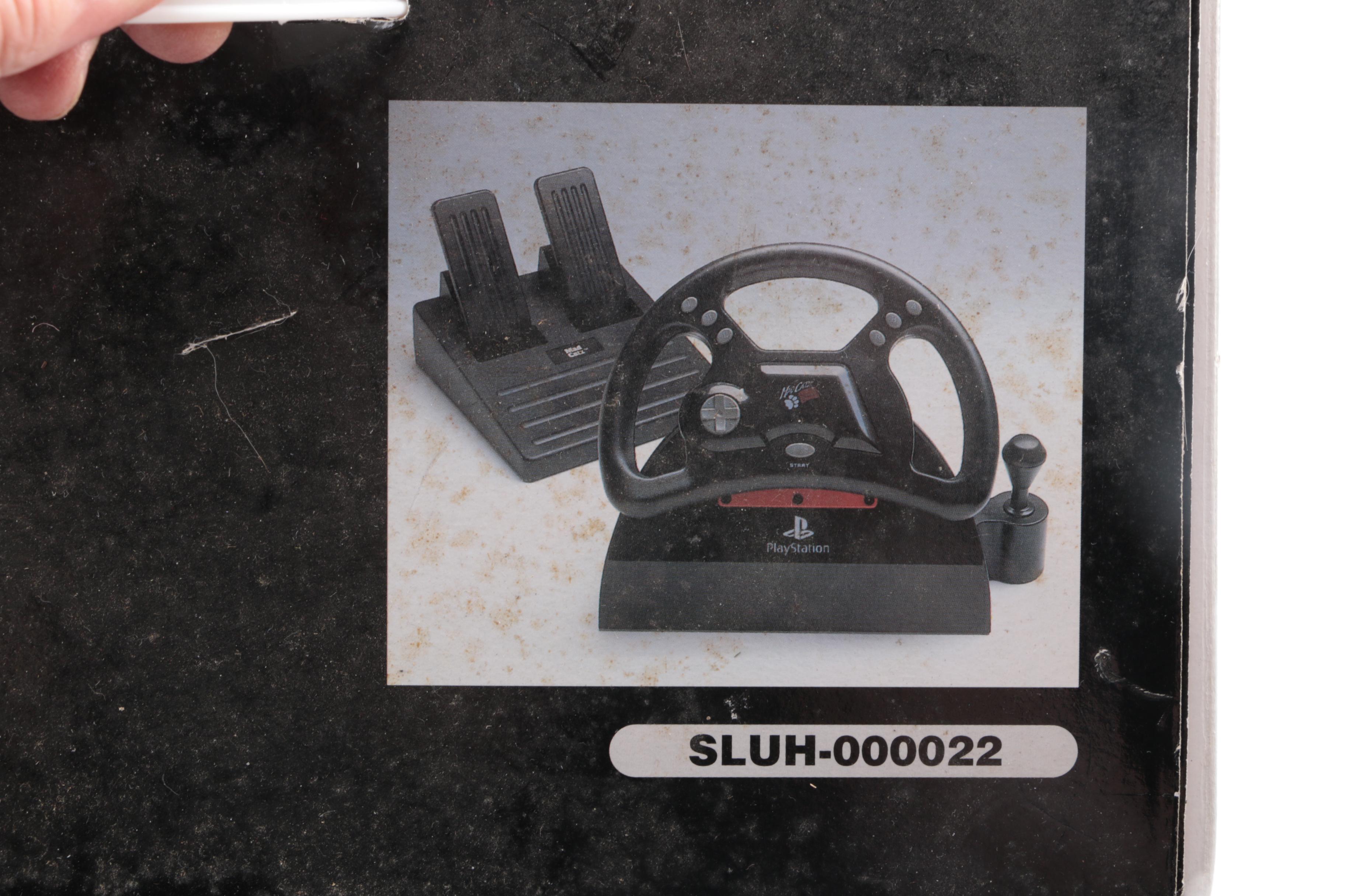 1990s Sony PlayStation SCPH-7001 with Mad Catz Accessories