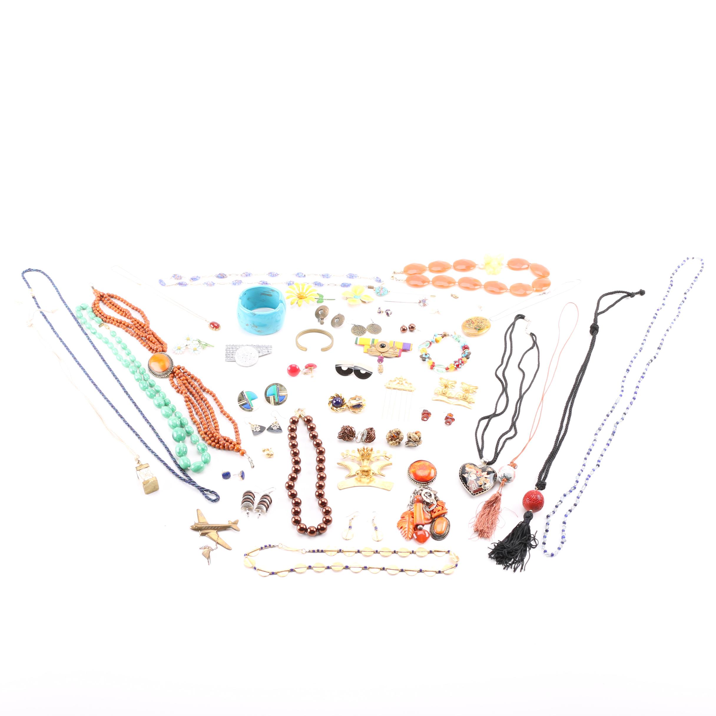 Costume Jewelry Including a Generous Assortment of Necklaces and Earrings