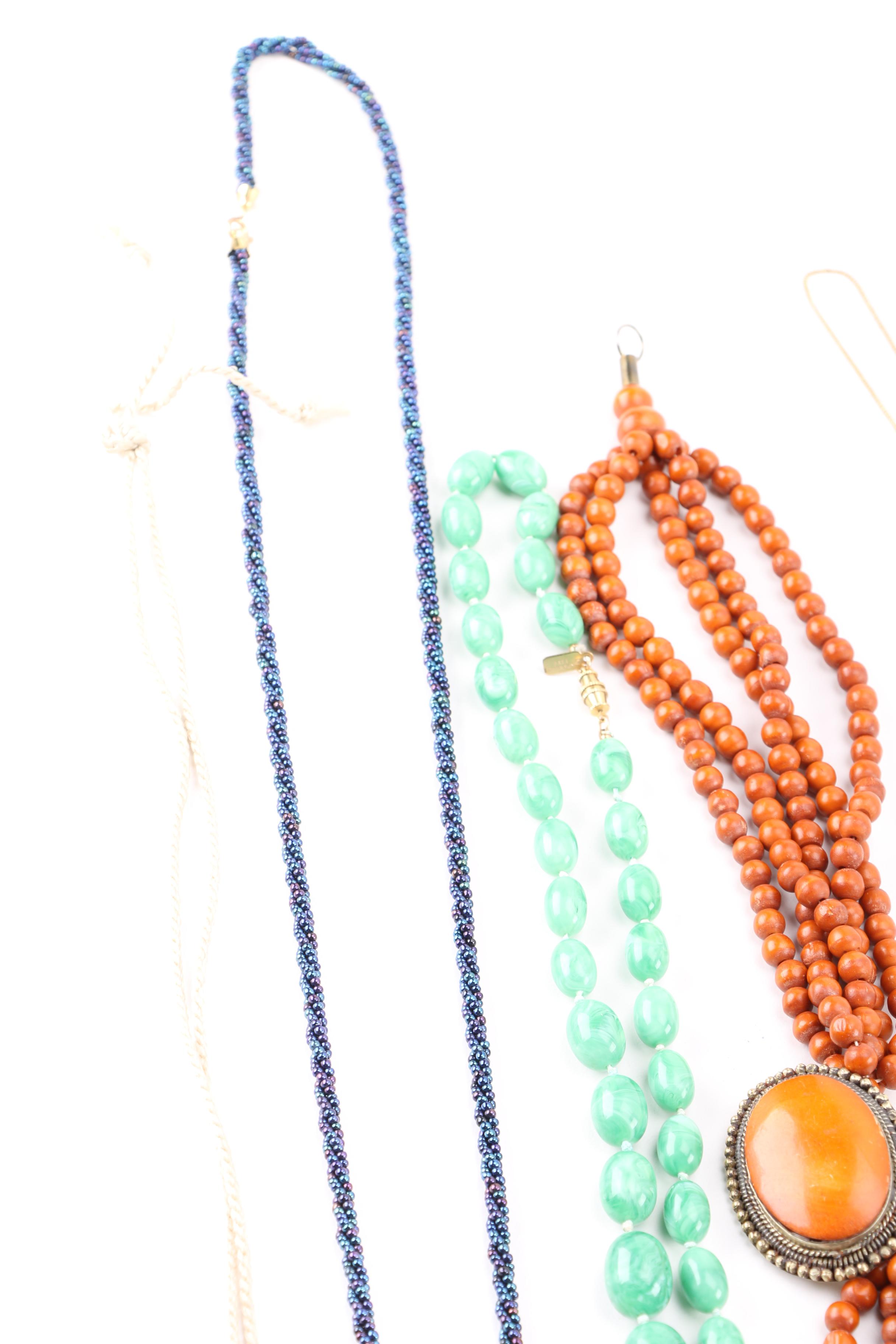 Costume Jewelry Including a Generous Assortment of Necklaces and Earrings