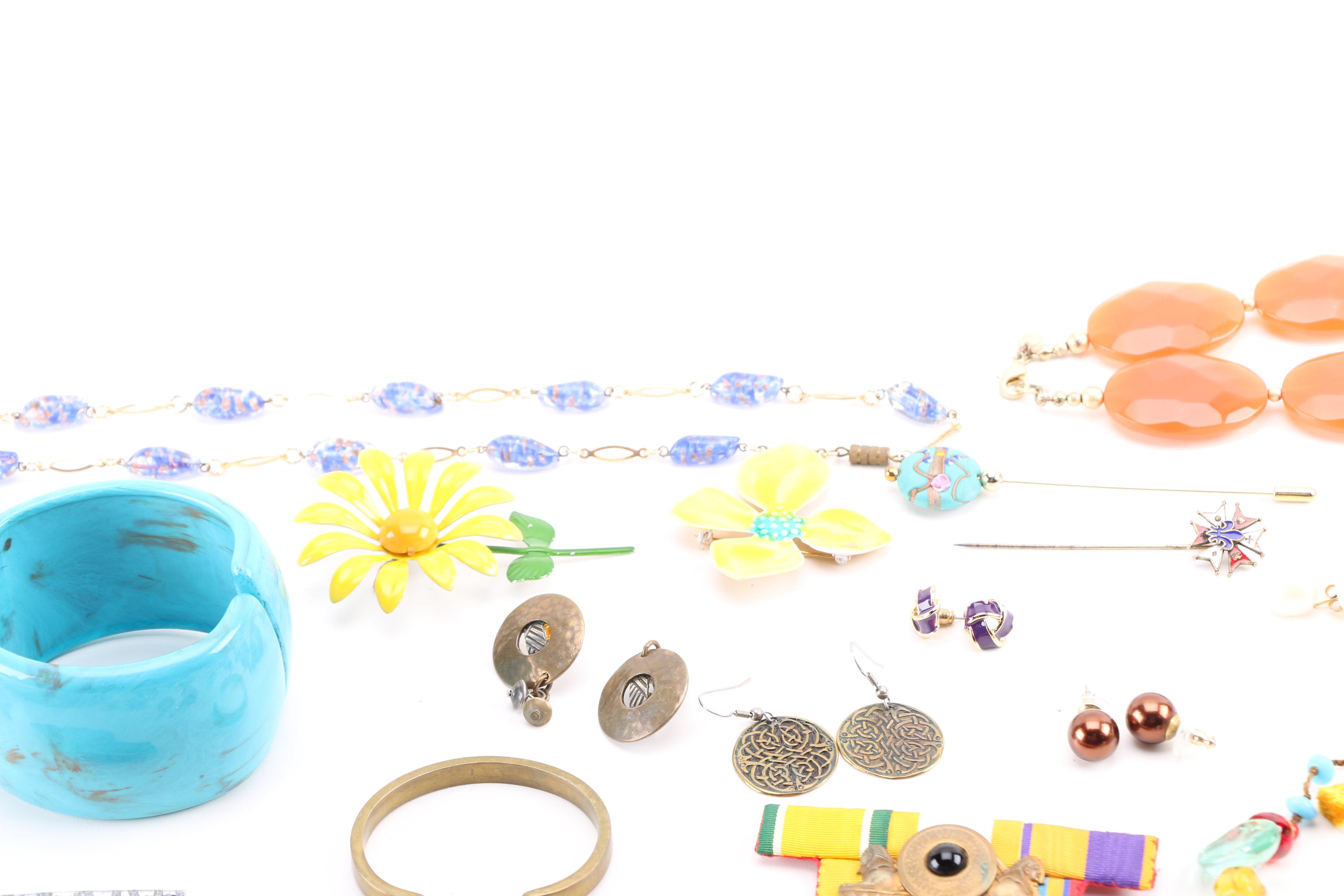 Costume Jewelry Including a Generous Assortment of Necklaces and Earrings
