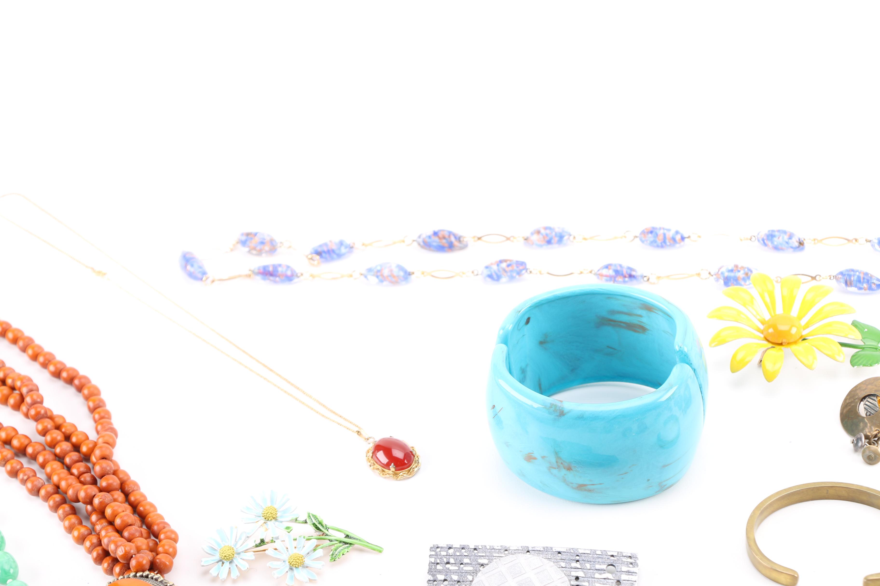 Costume Jewelry Including a Generous Assortment of Necklaces and Earrings