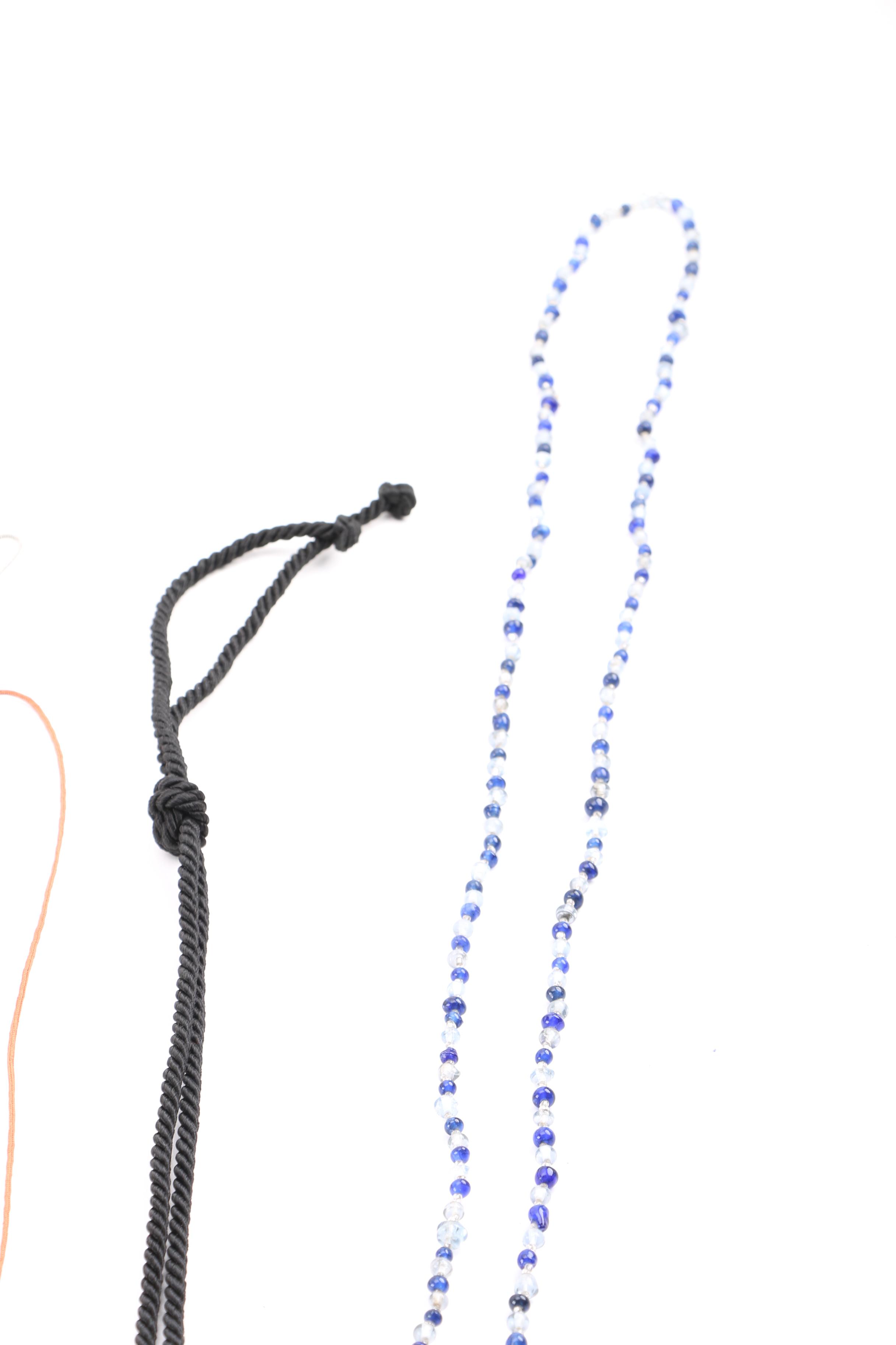 Costume Jewelry Including a Generous Assortment of Necklaces and Earrings