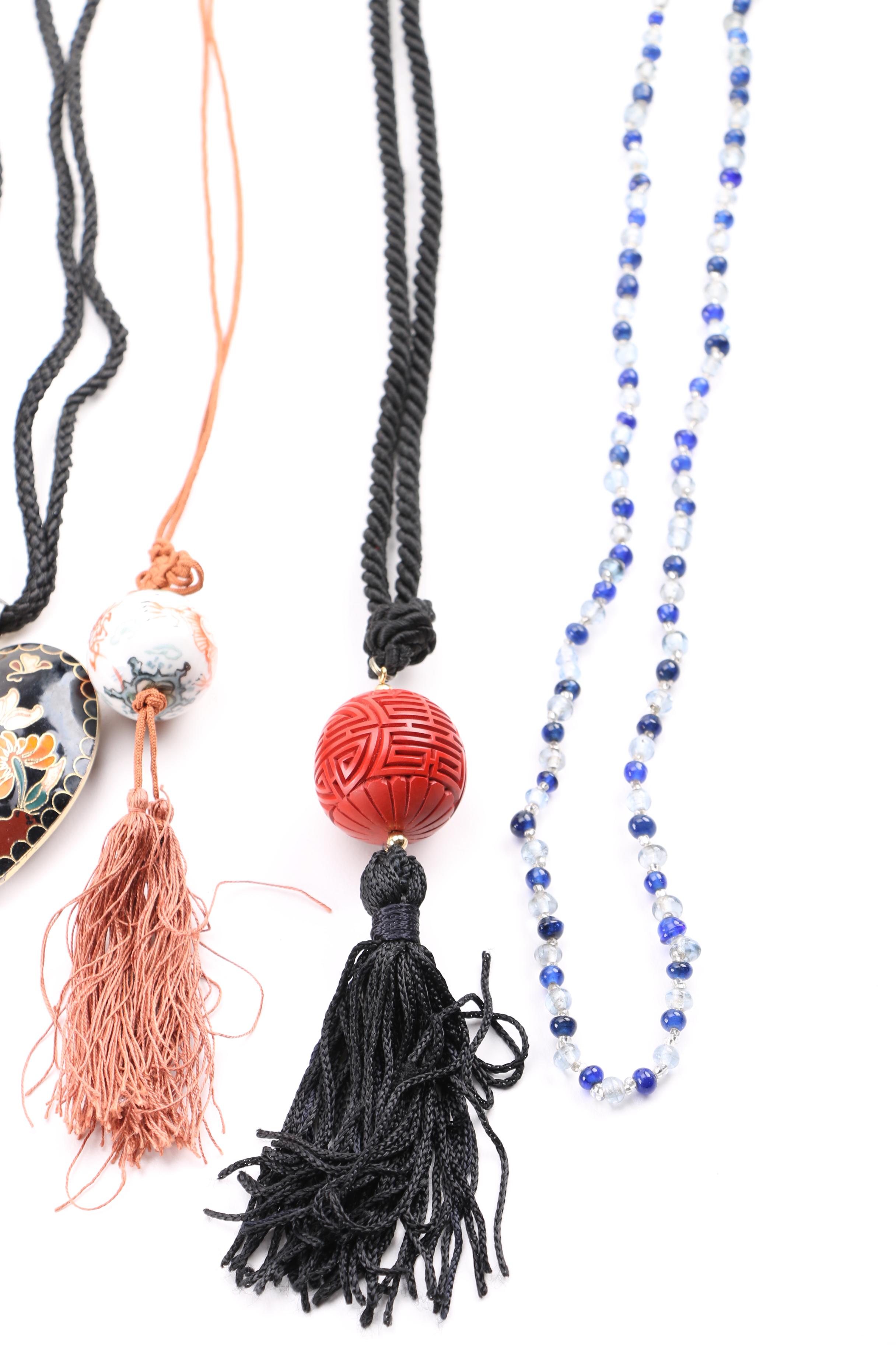 Costume Jewelry Including a Generous Assortment of Necklaces and Earrings