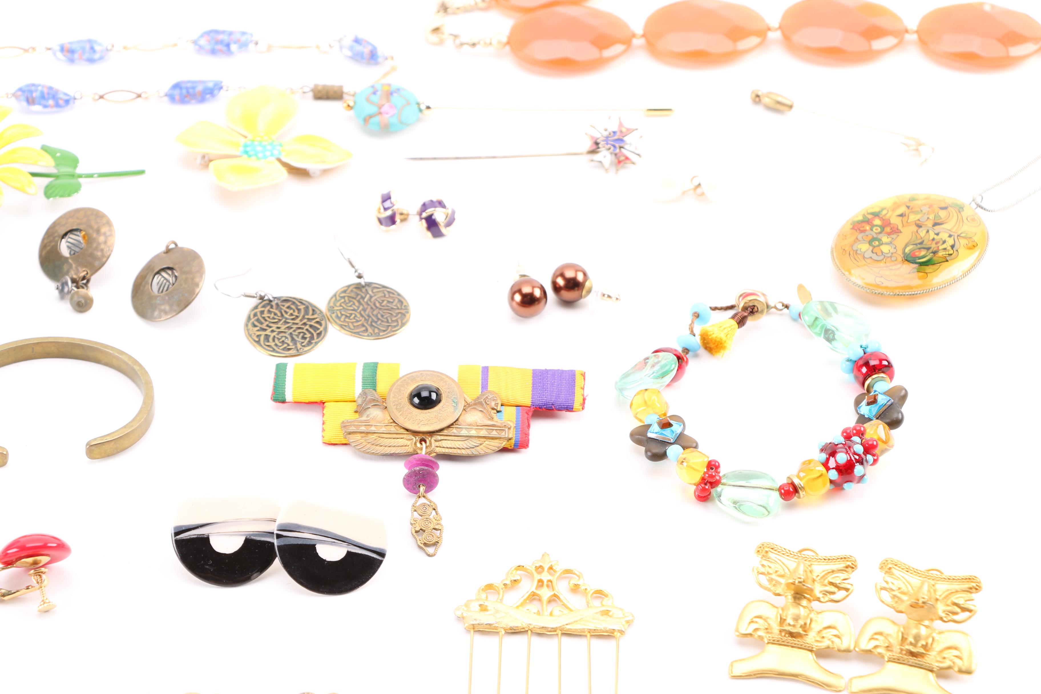 Costume Jewelry Including a Generous Assortment of Necklaces and Earrings