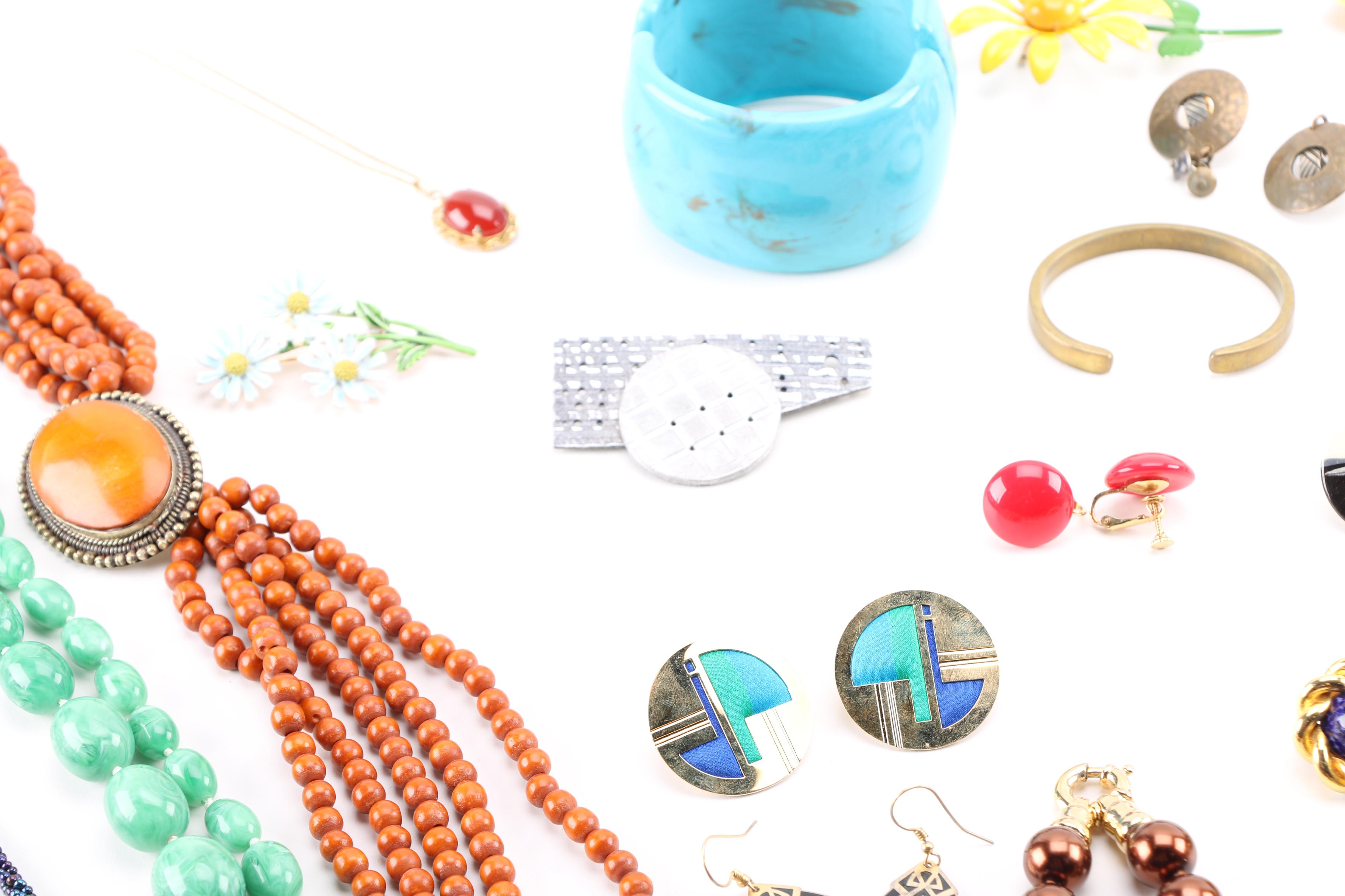 Costume Jewelry Including a Generous Assortment of Necklaces and Earrings