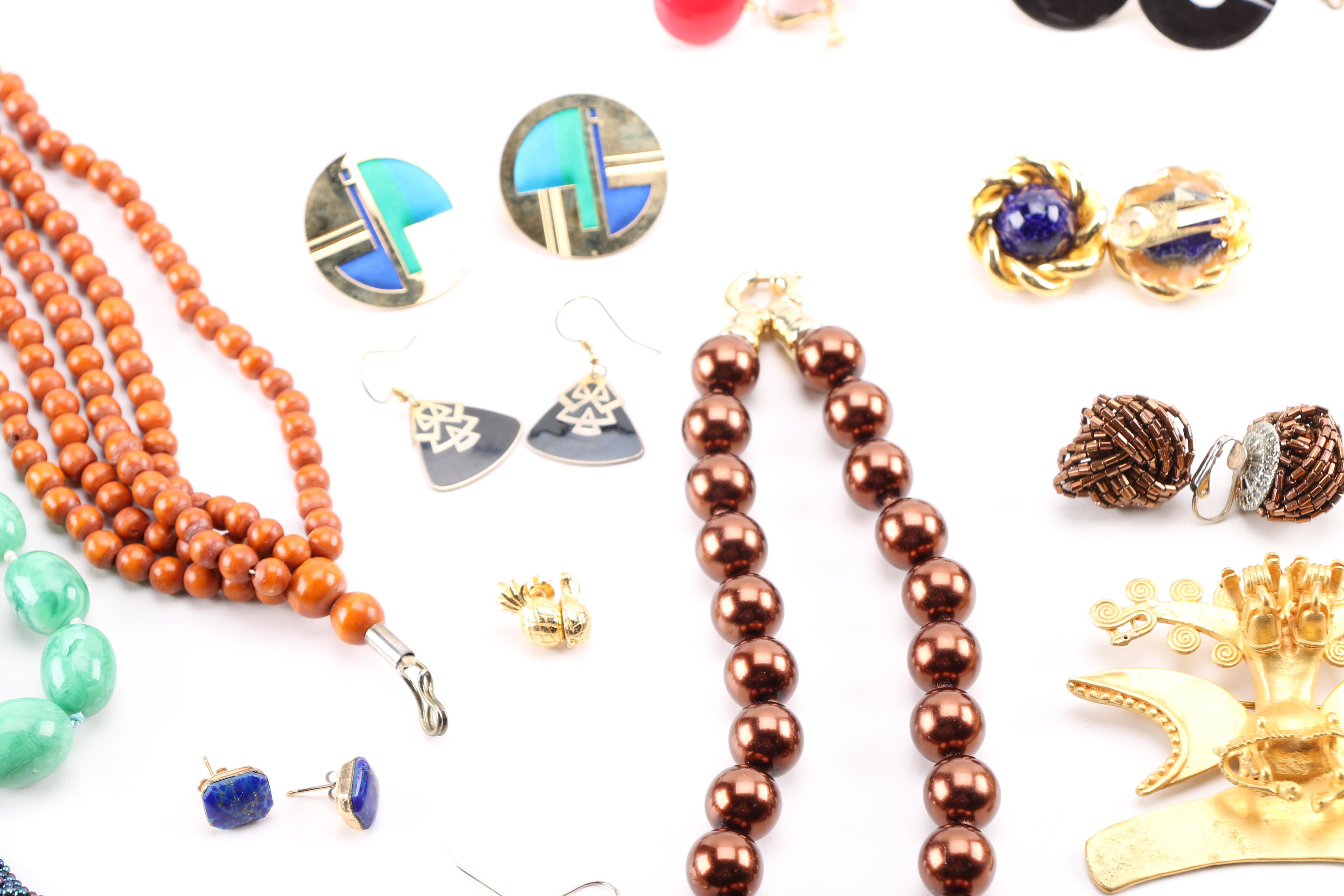 Costume Jewelry Including a Generous Assortment of Necklaces and Earrings