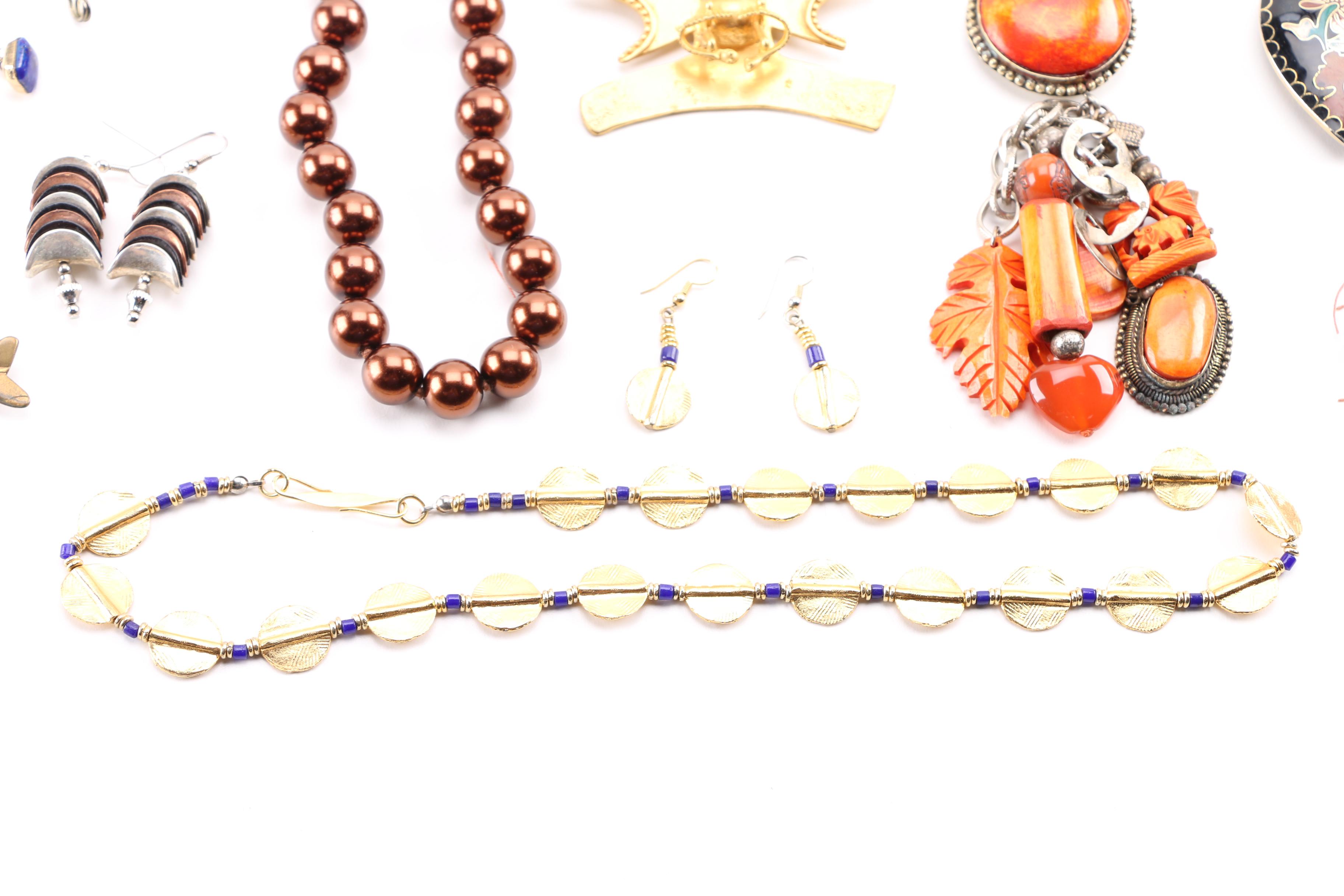 Costume Jewelry Including a Generous Assortment of Necklaces and Earrings
