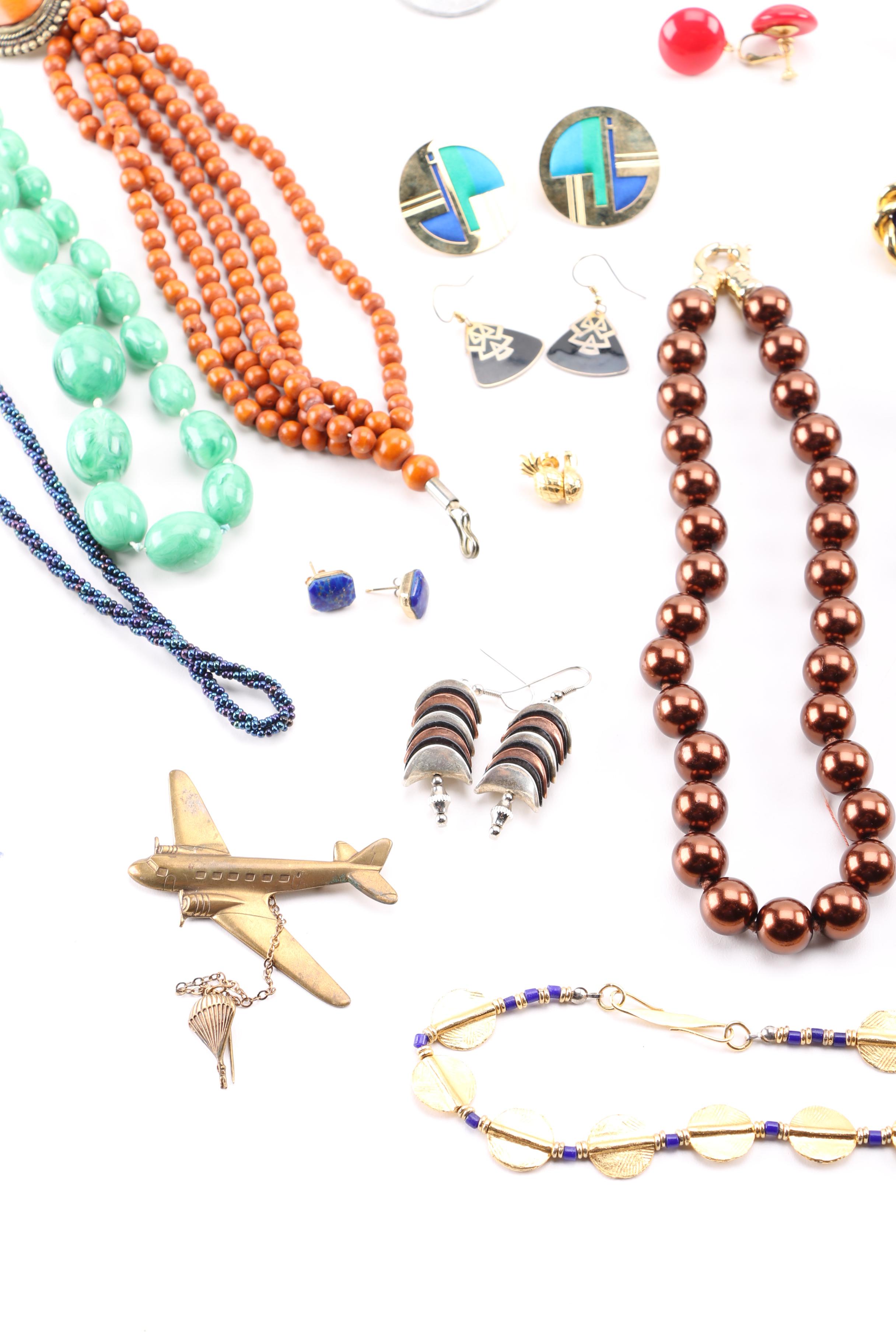Costume Jewelry Including a Generous Assortment of Necklaces and Earrings