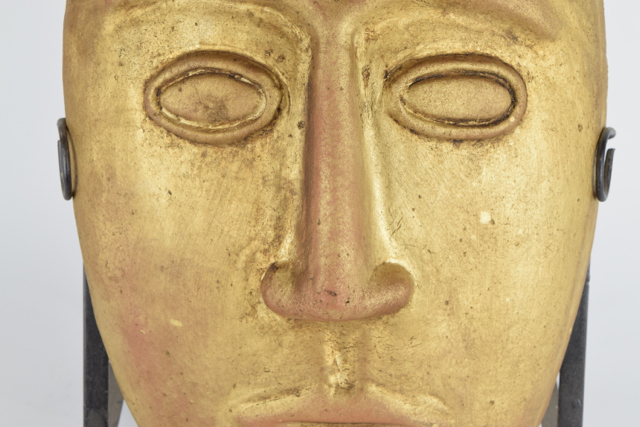 Gilt Tone Terracotta Mask in Metalwork Stand