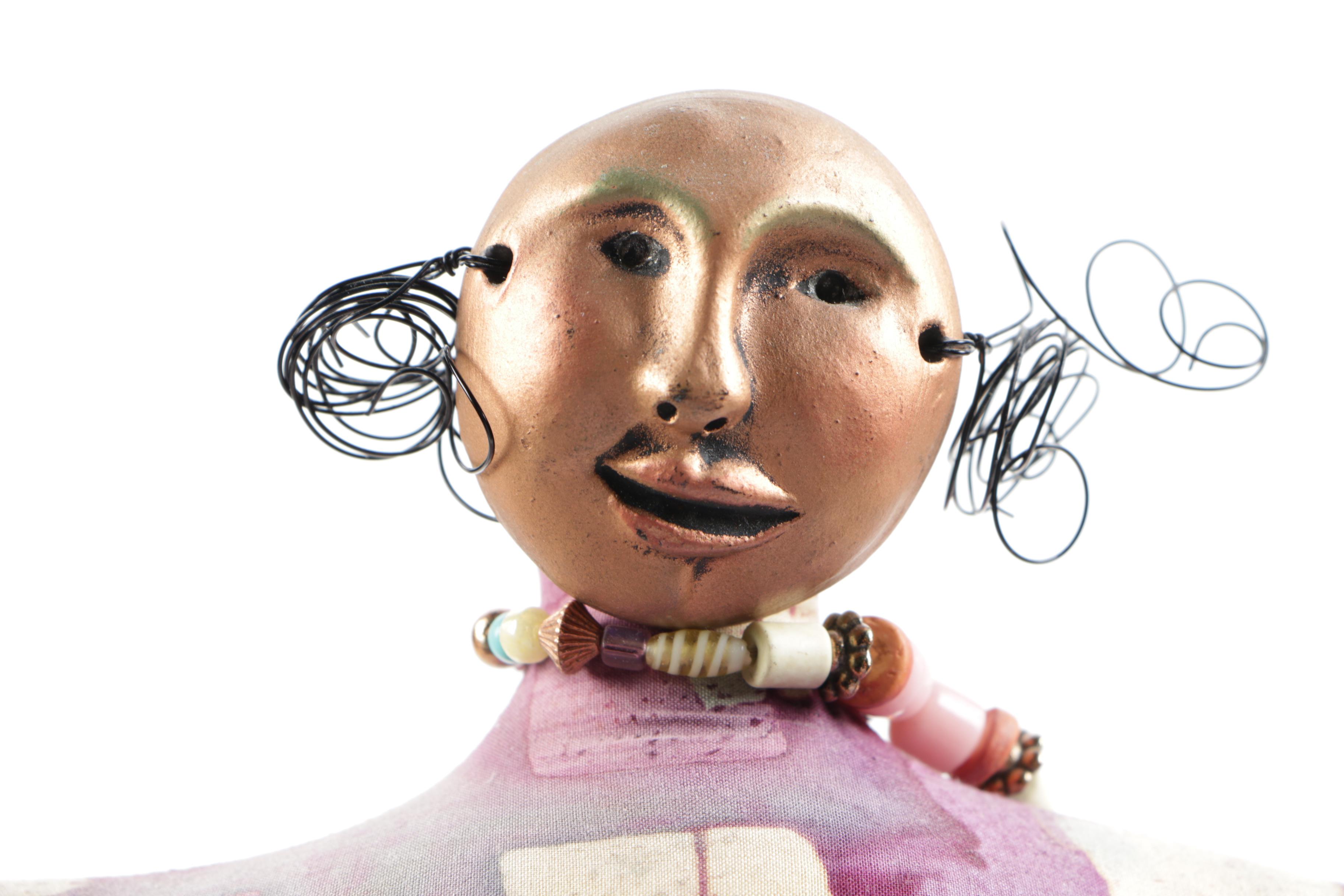 Cloth Figural Sculpture With Beaded Necklace