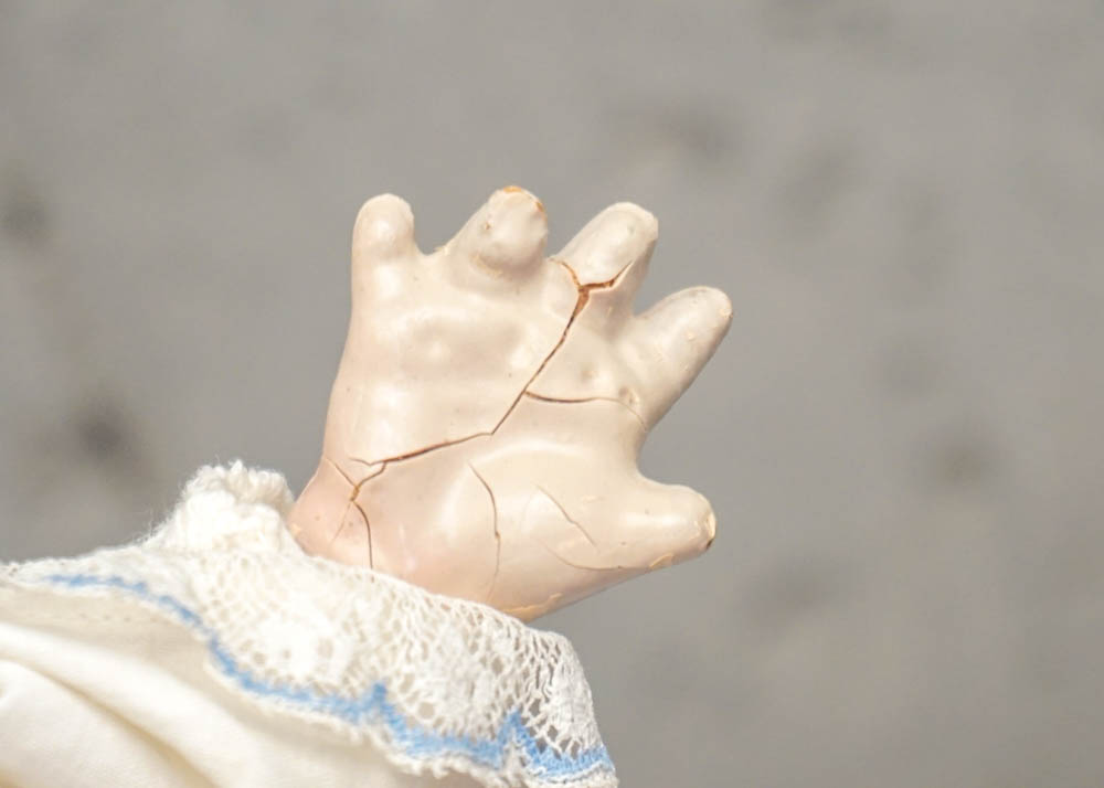 Vintage Spool Style Cradle With Porcelain Doll