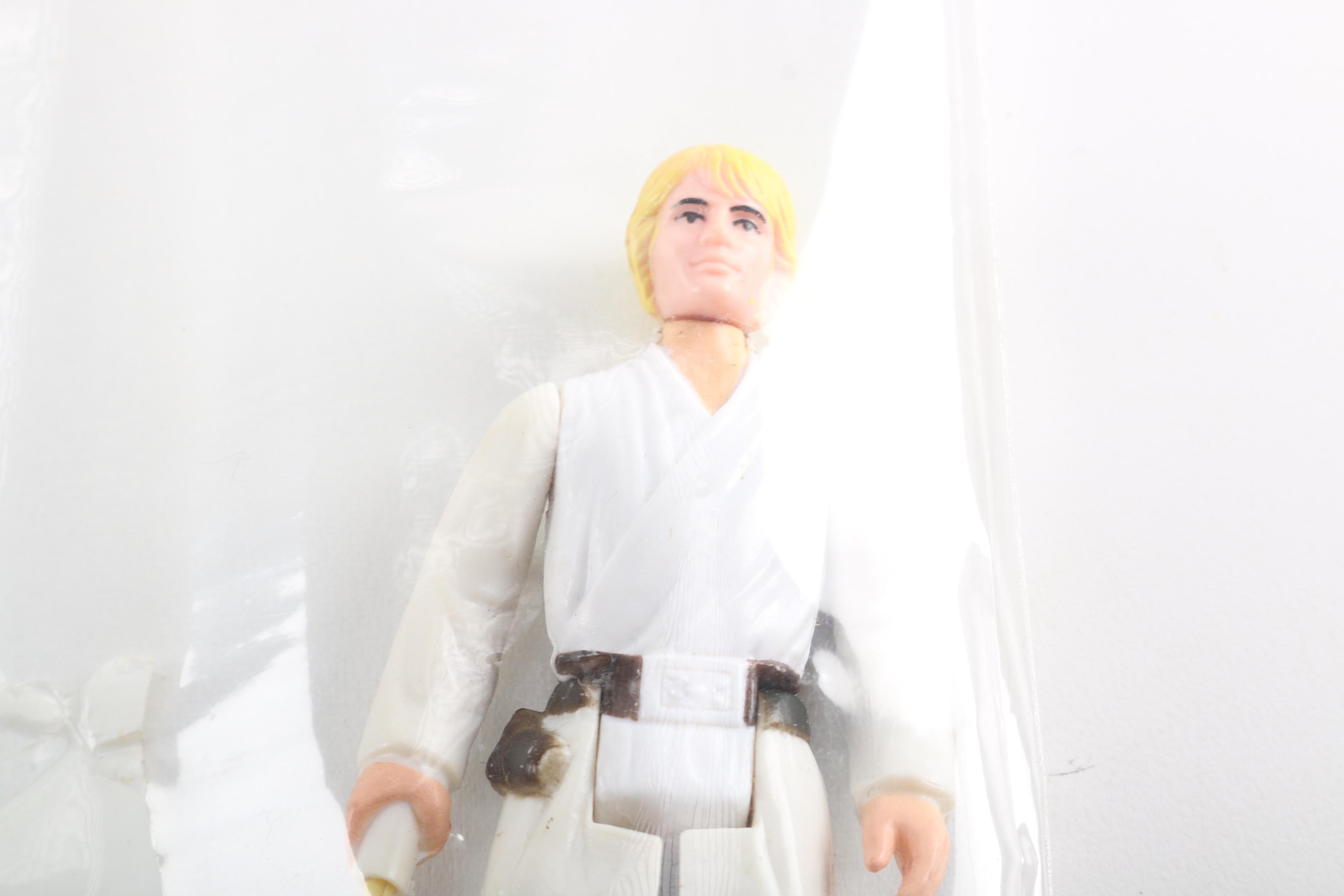 "Star Wars" Han Solo, Luke Skywalker, and Chewbacca Figures