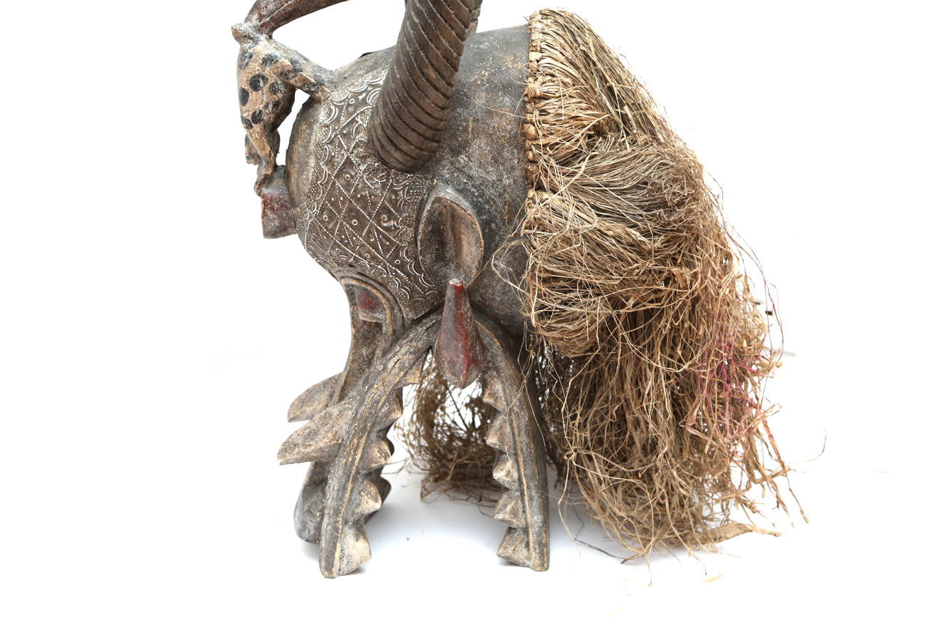 Hand Carved Tribal Head With Straw And Metal