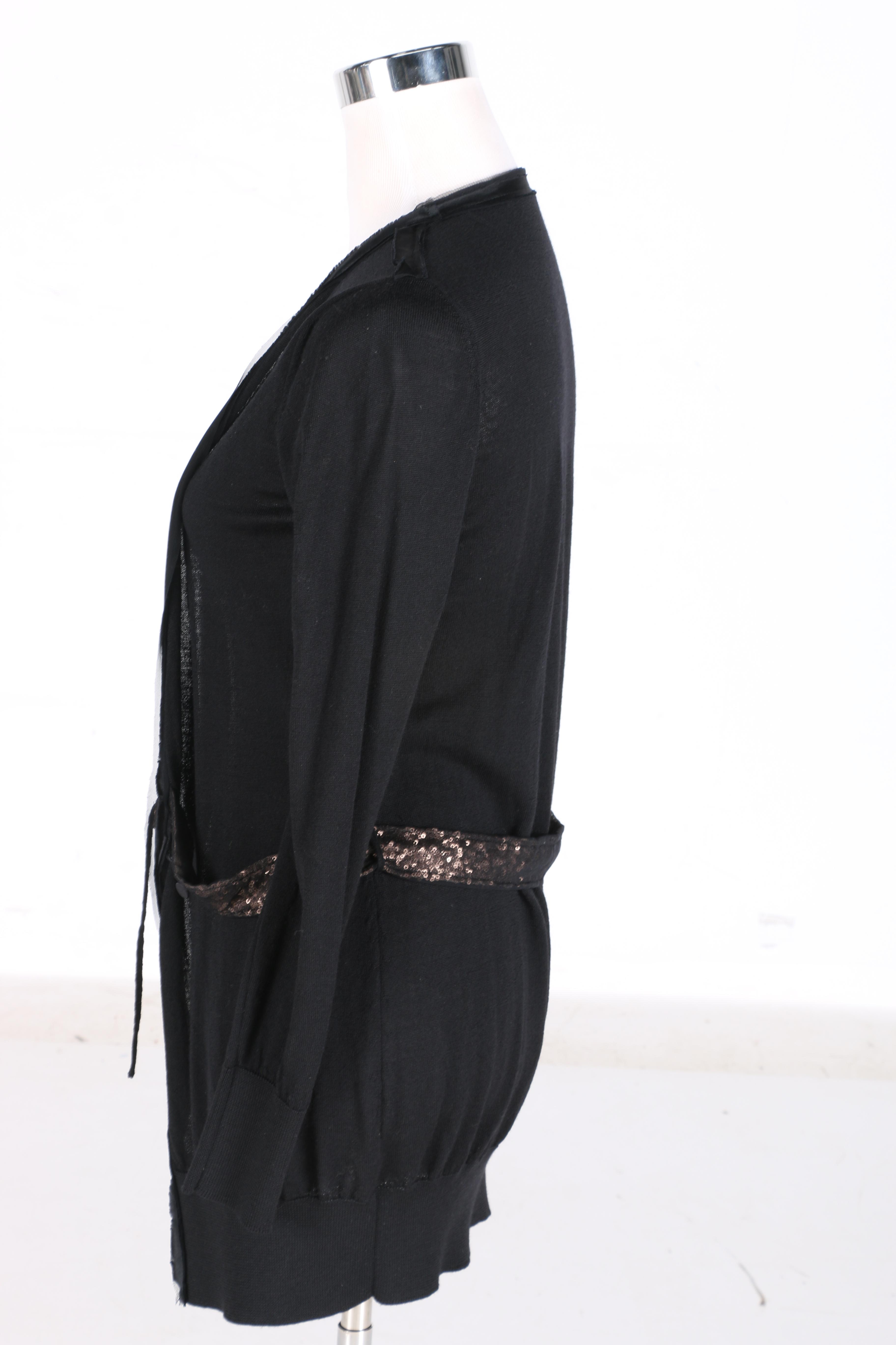 Cardigans by One Grey Day and Clare Tough