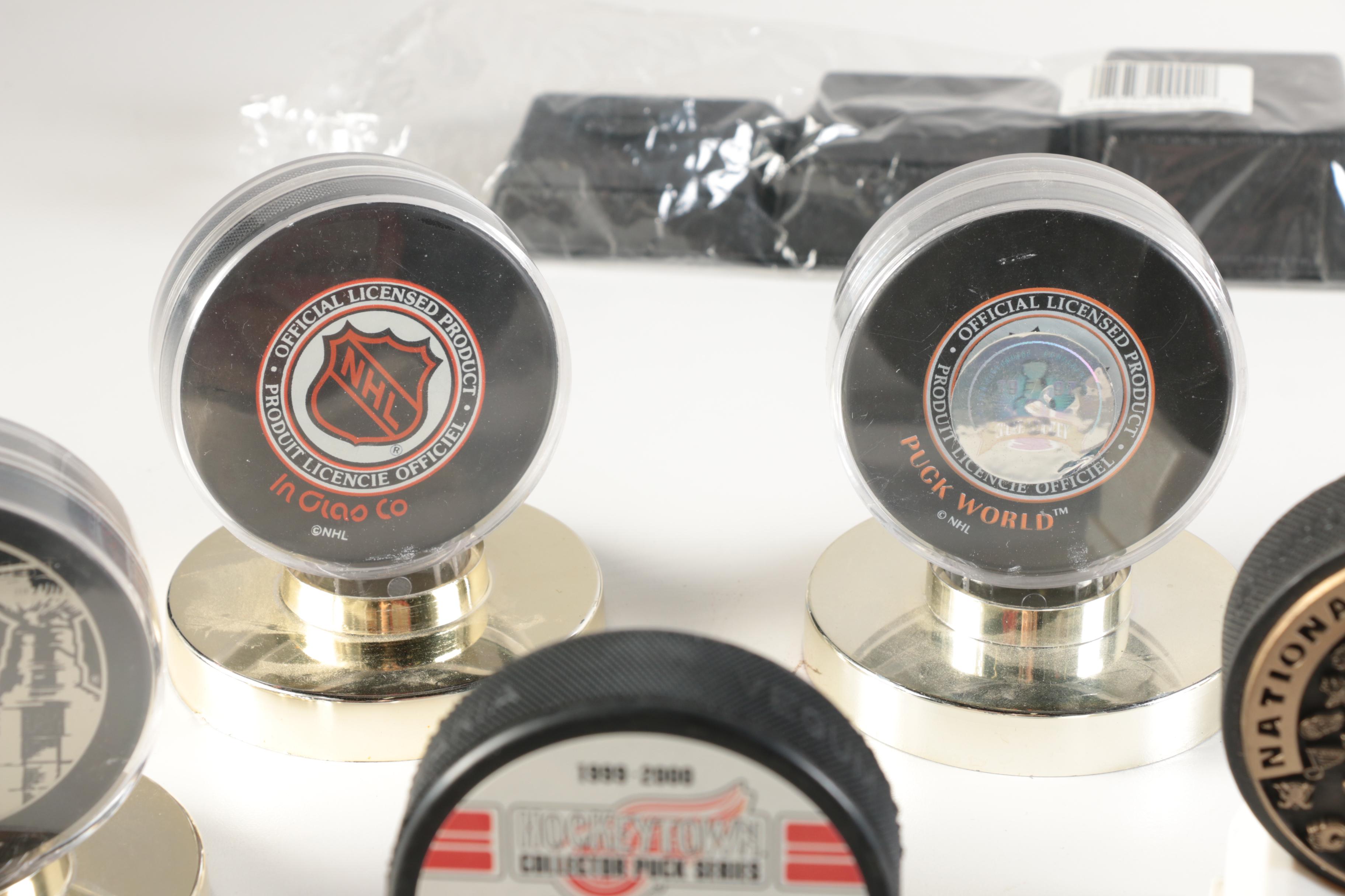 Assortment of Hockey Pucks