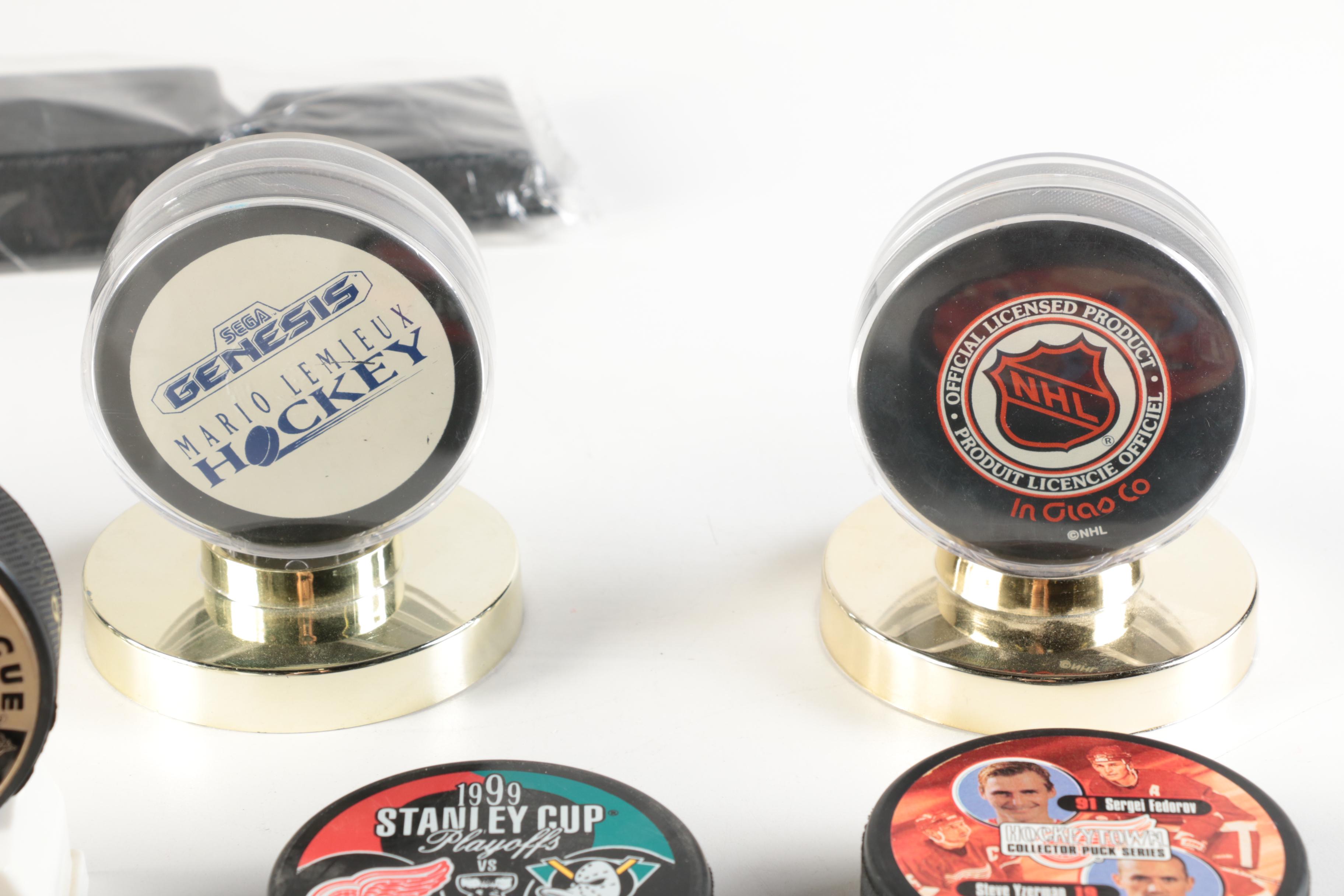 Assortment of Hockey Pucks