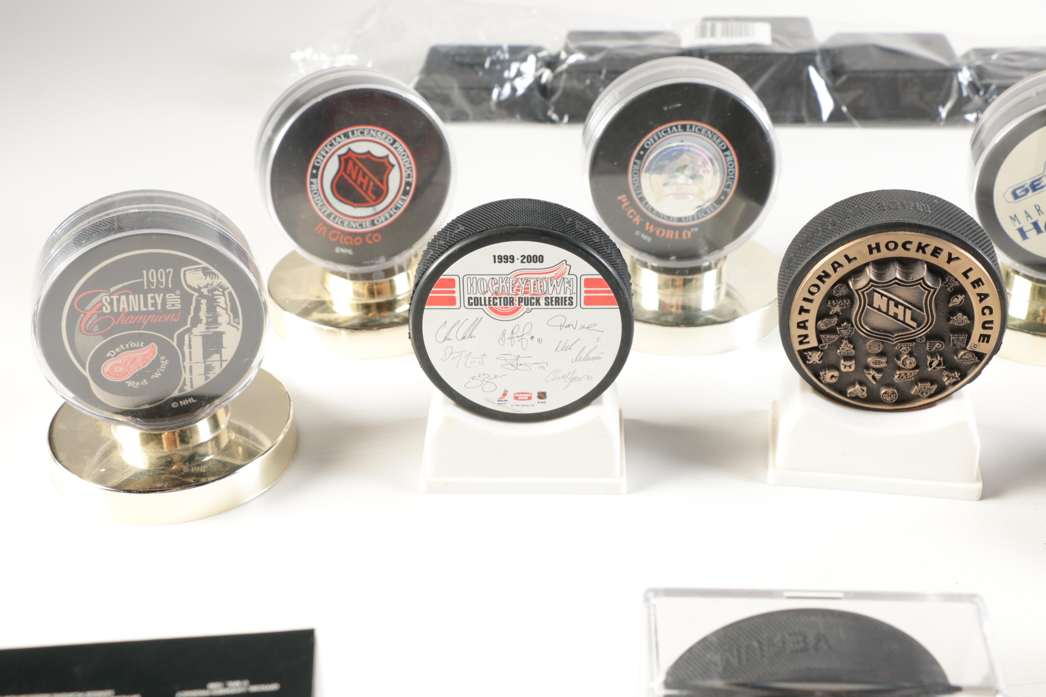 Assortment of Hockey Pucks