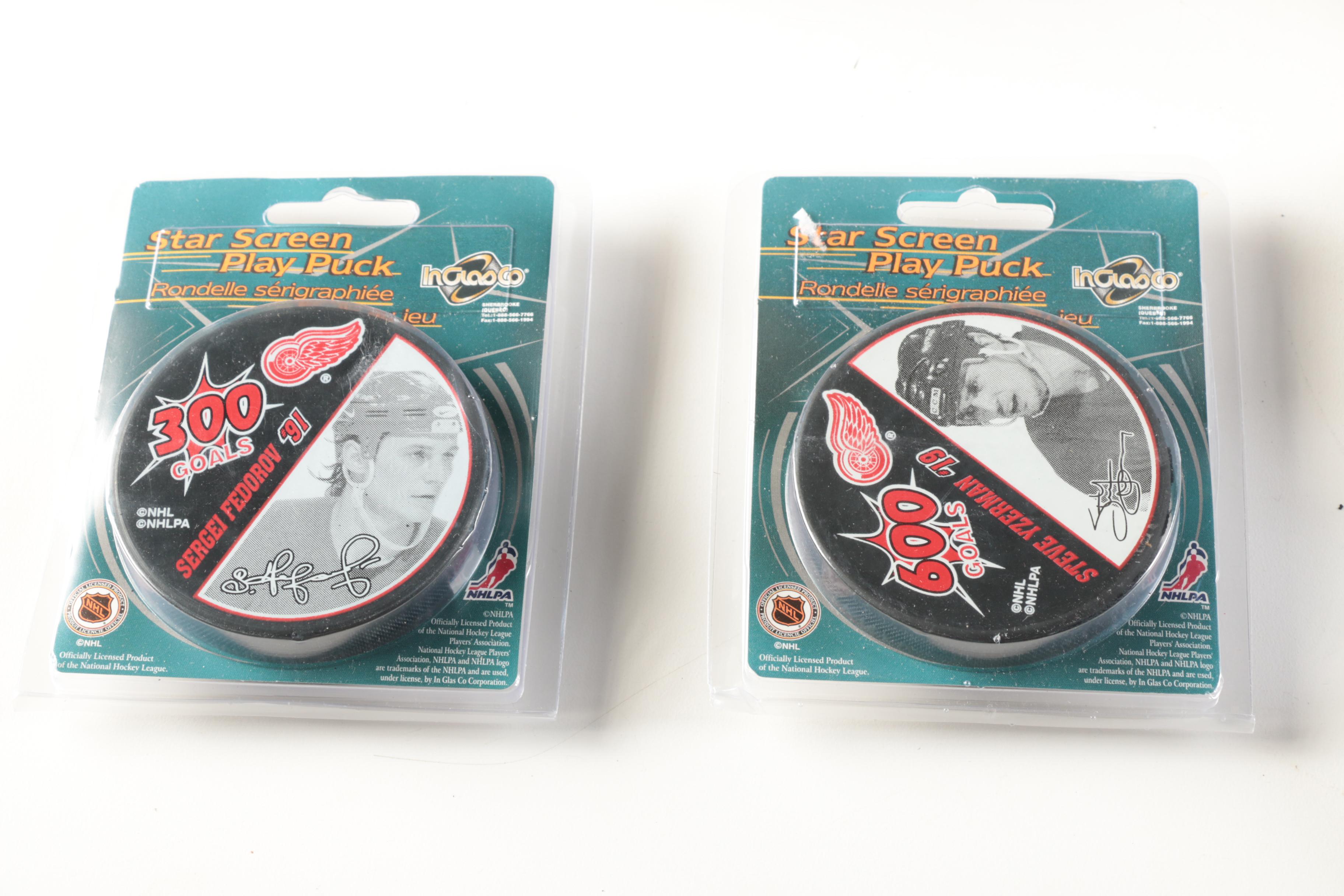 Assortment of Hockey Pucks