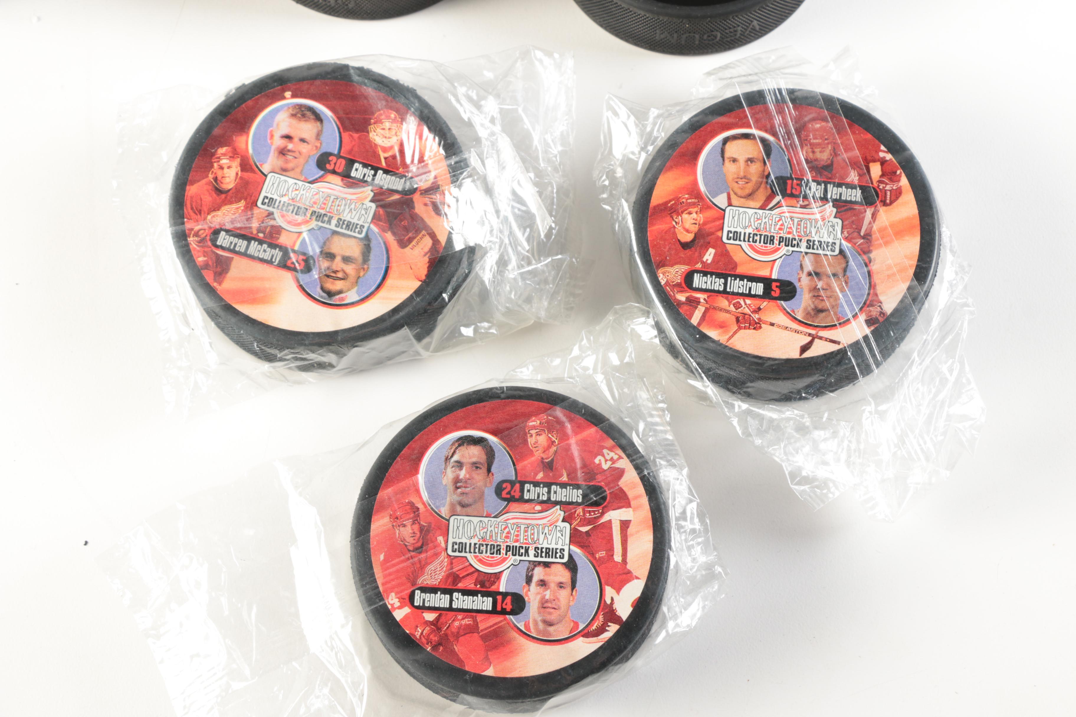 Assortment of Hockey Pucks