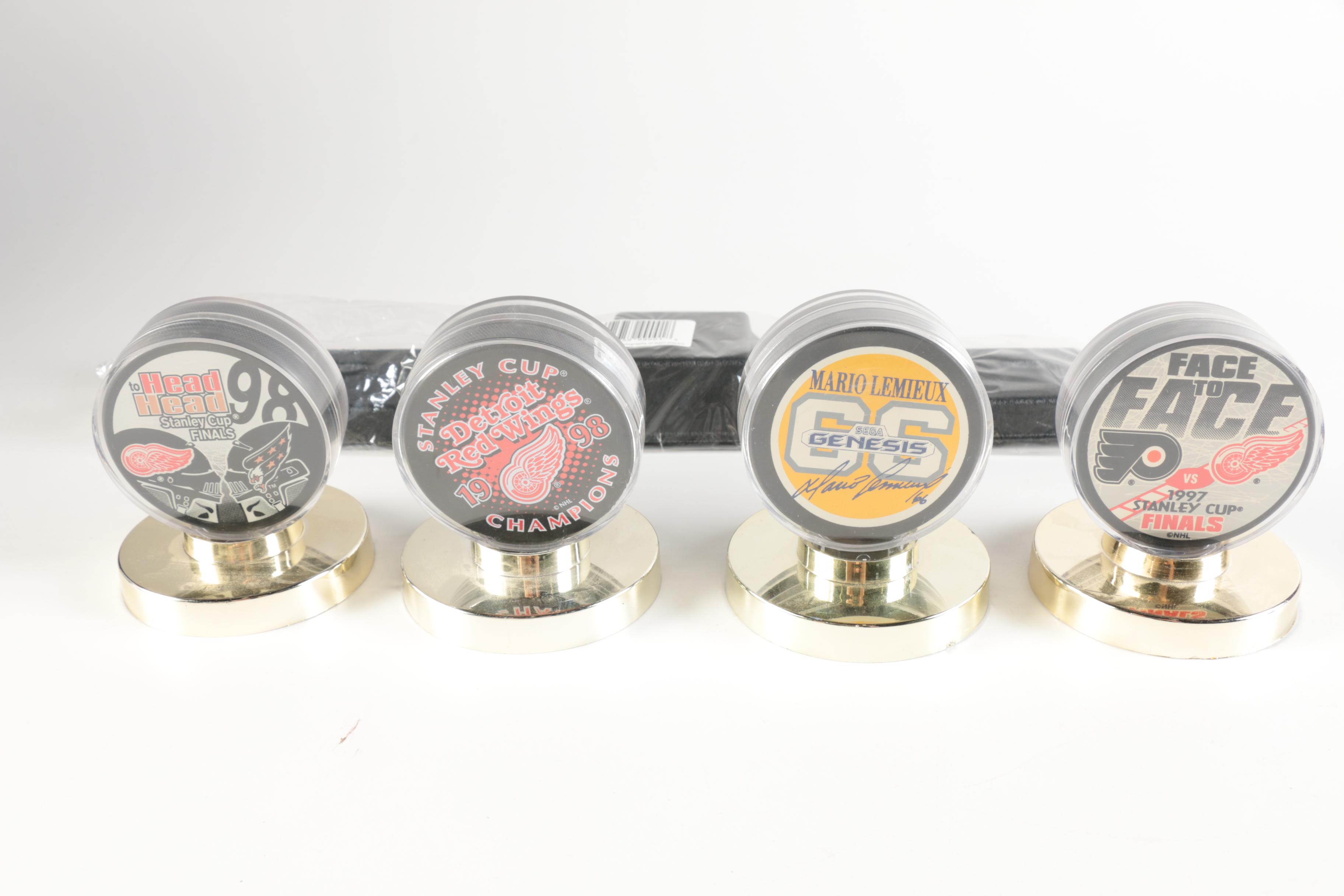 Assortment of Hockey Pucks