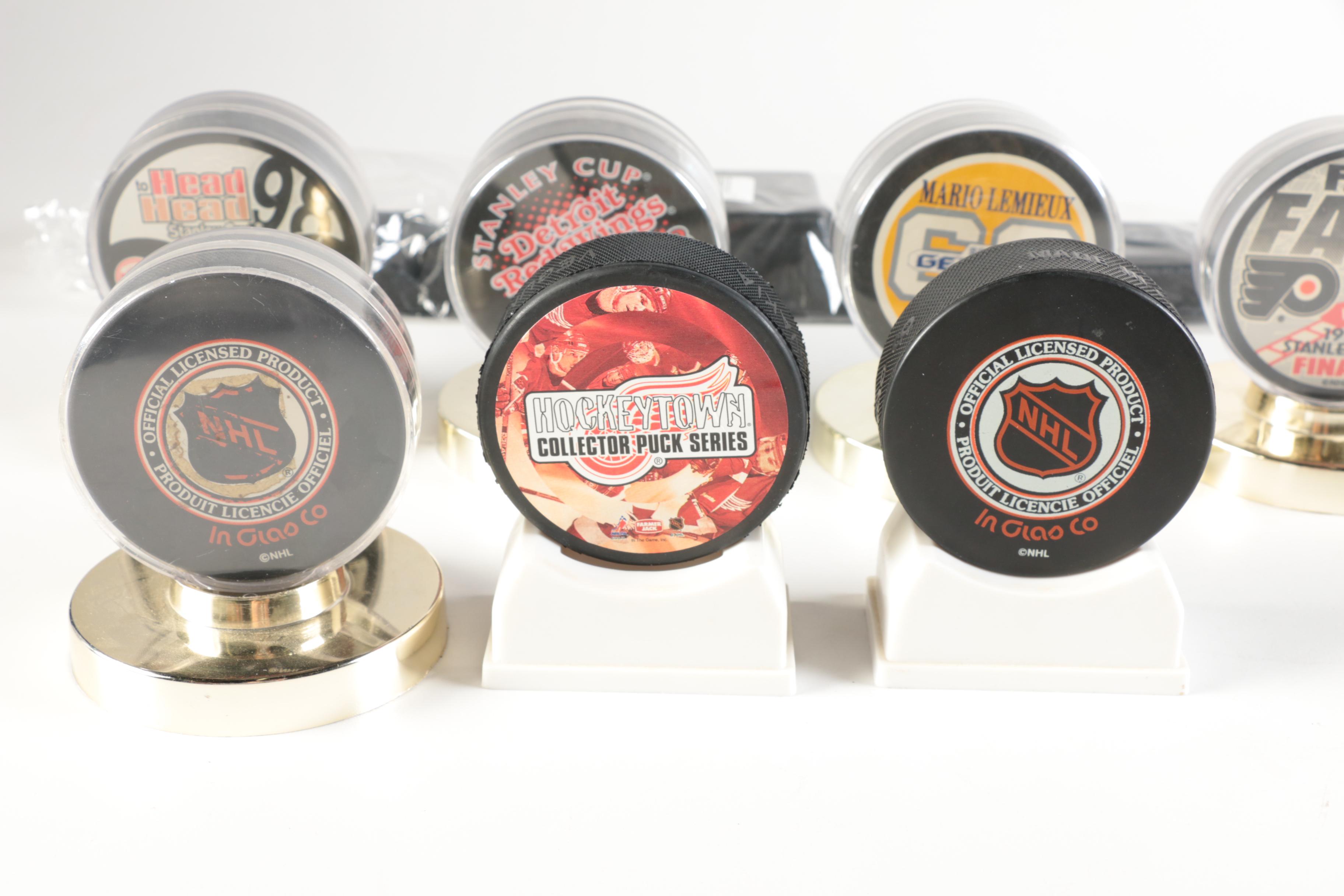 Assortment of Hockey Pucks