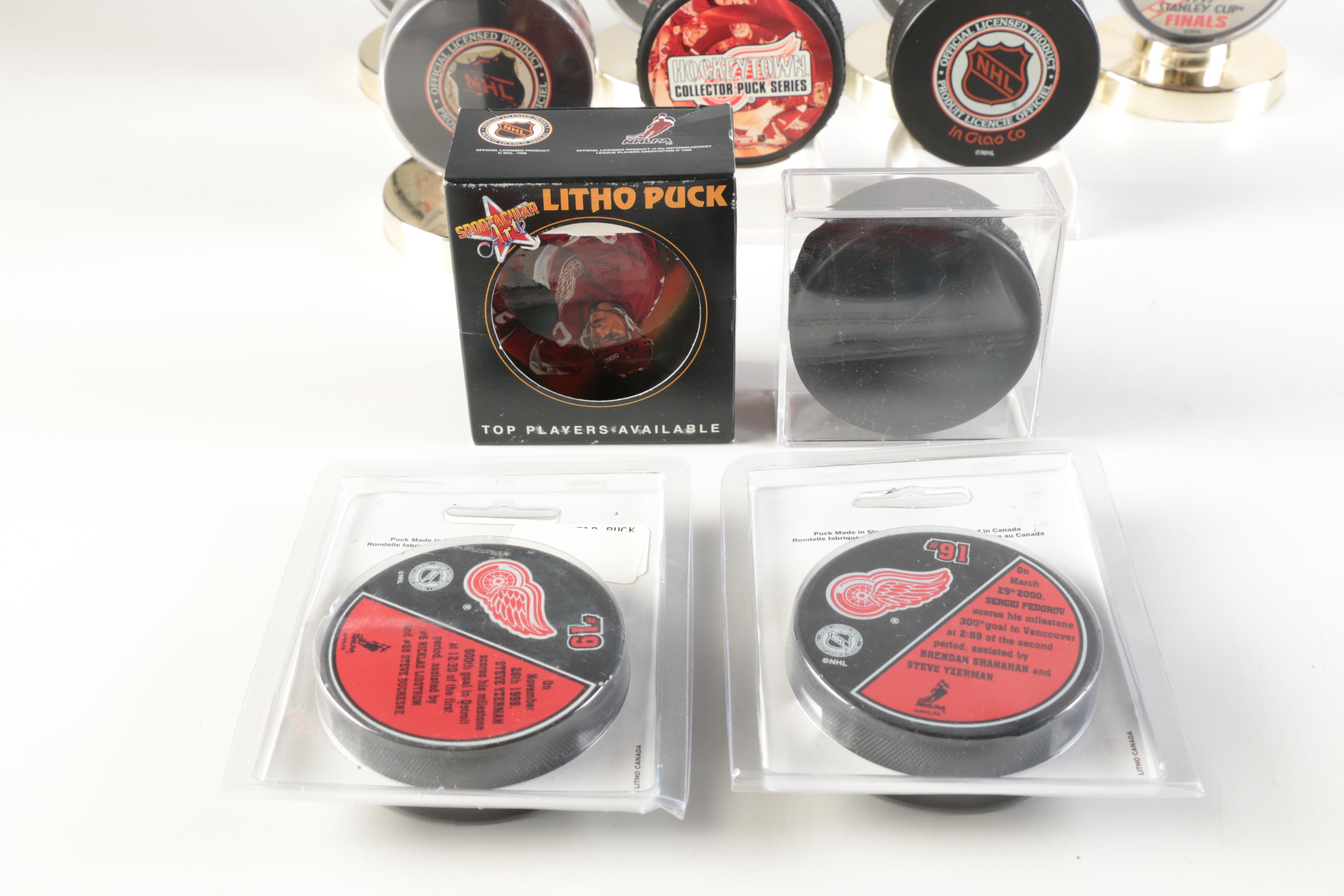 Assortment of Hockey Pucks