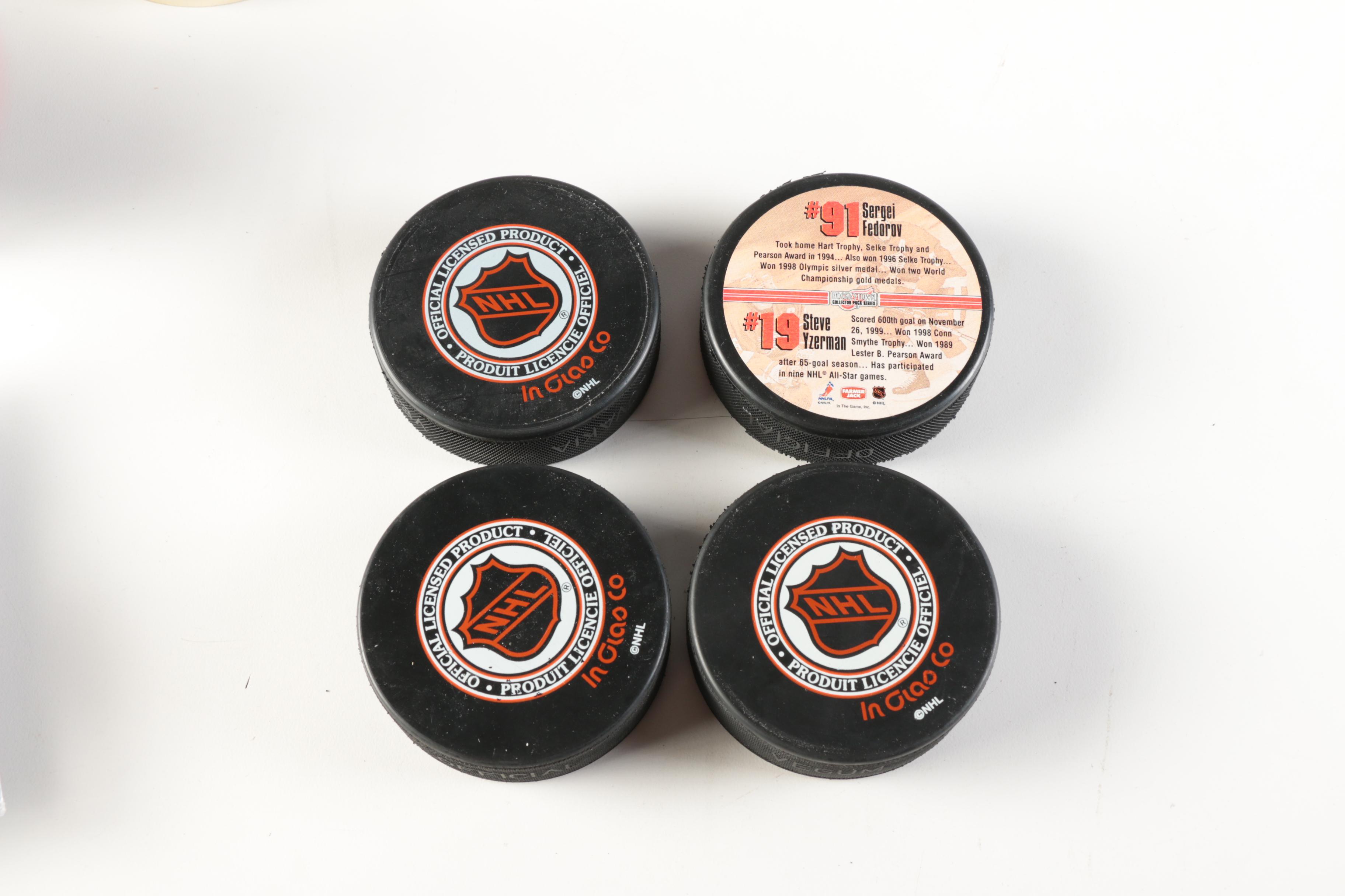 Assortment of Hockey Pucks