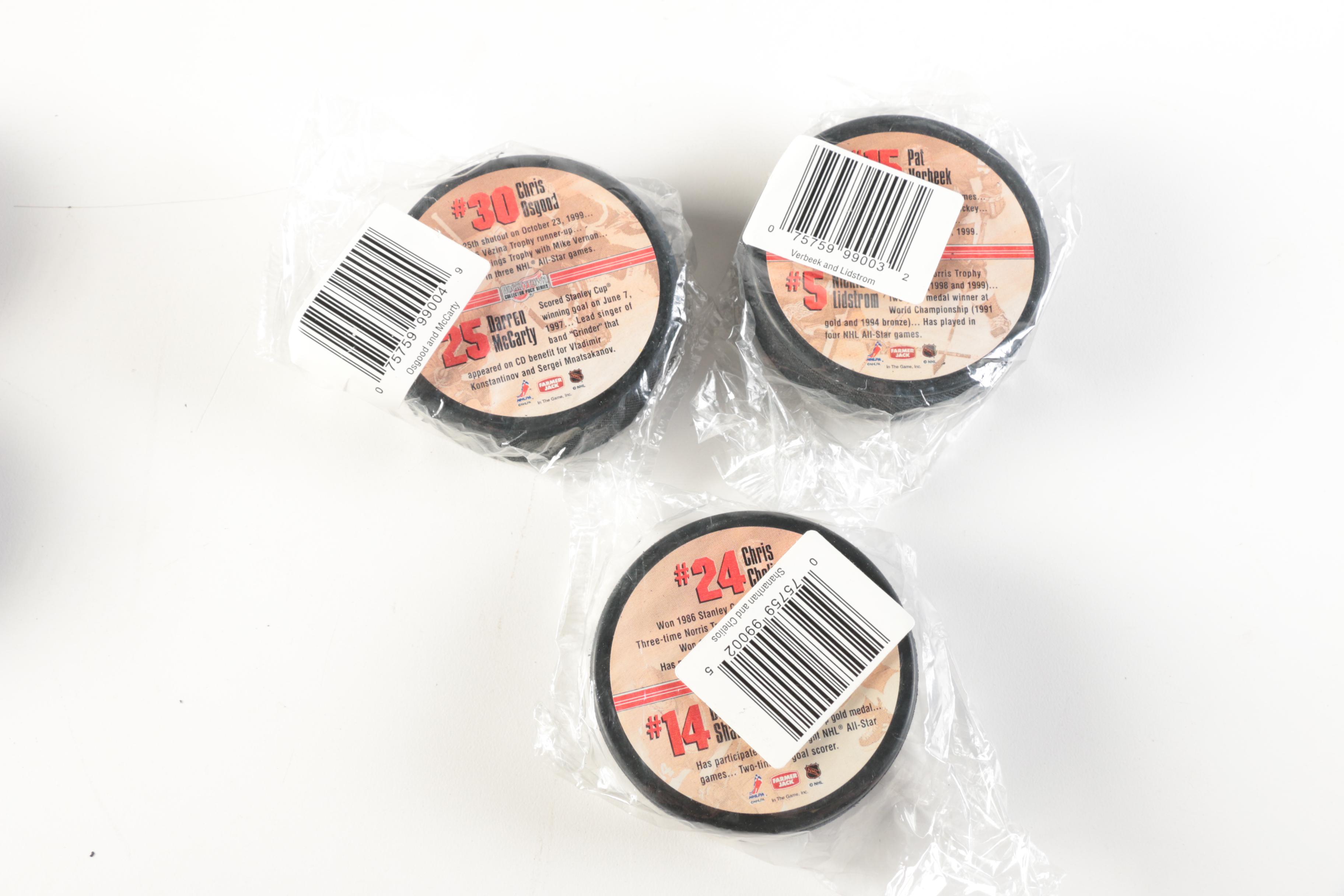 Assortment of Hockey Pucks