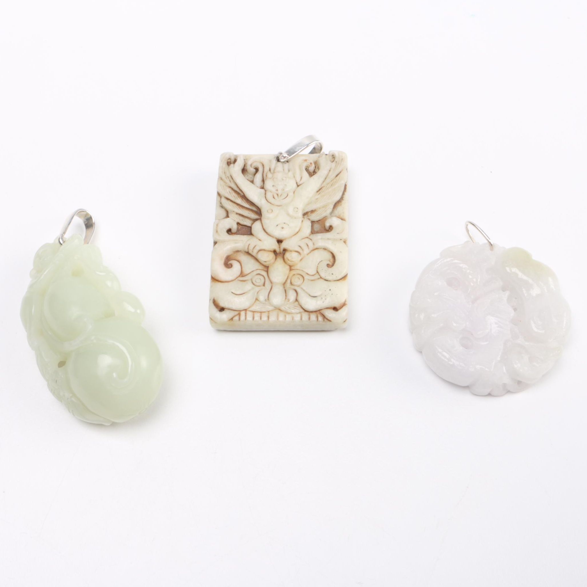 Selection of Pendants Featuring Jadeite and Serpentine