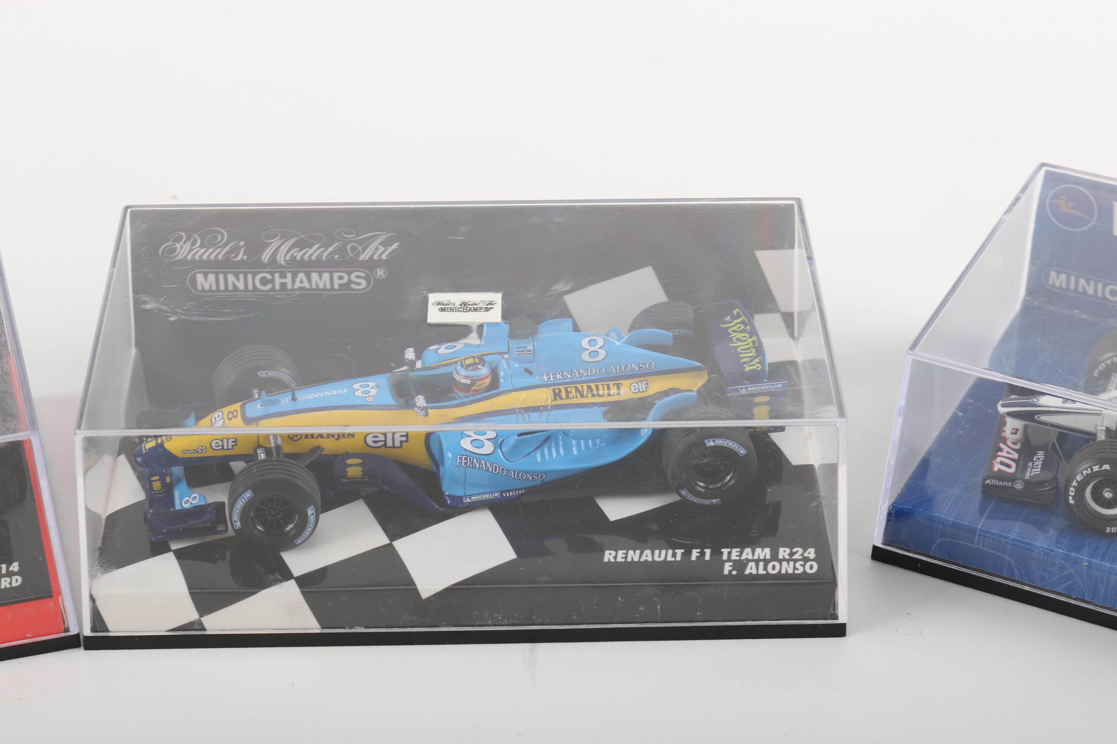 Collection of 1996 Model Helmets and F1 Cars From Various F1 Drivers