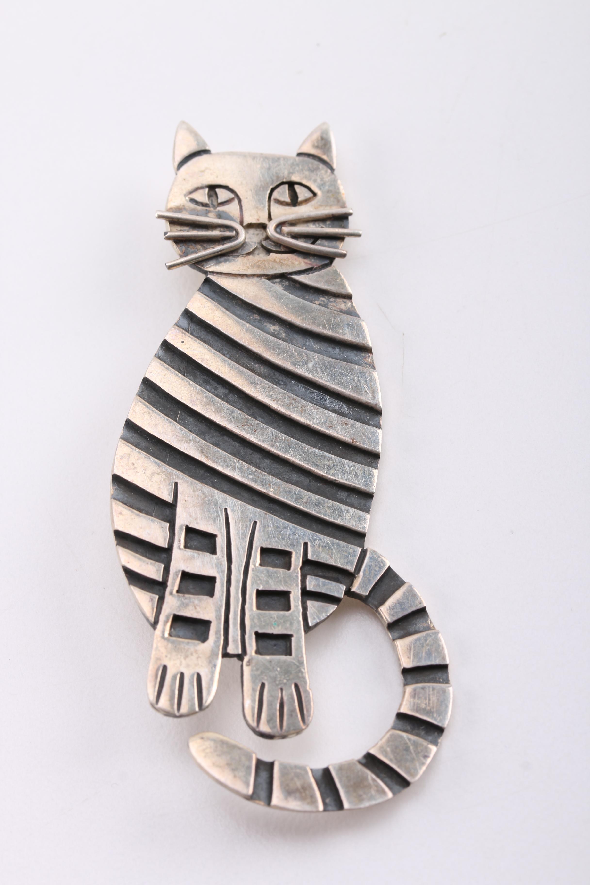 Sterling Silver Brooches, Earrings and Charm Bracelet