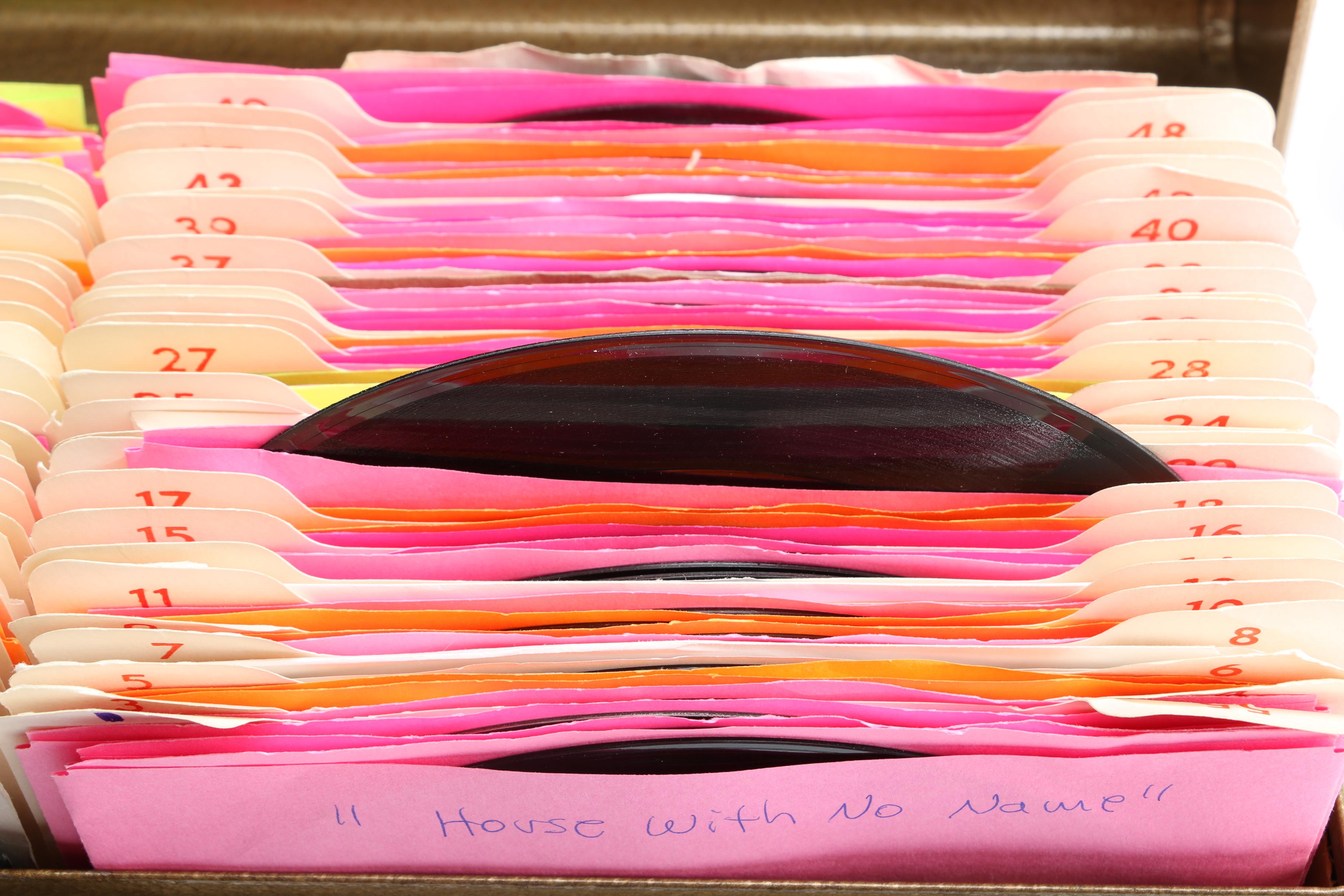 Vintage 45 RPM Cases With Records Including ELO and Fleetwood Mac