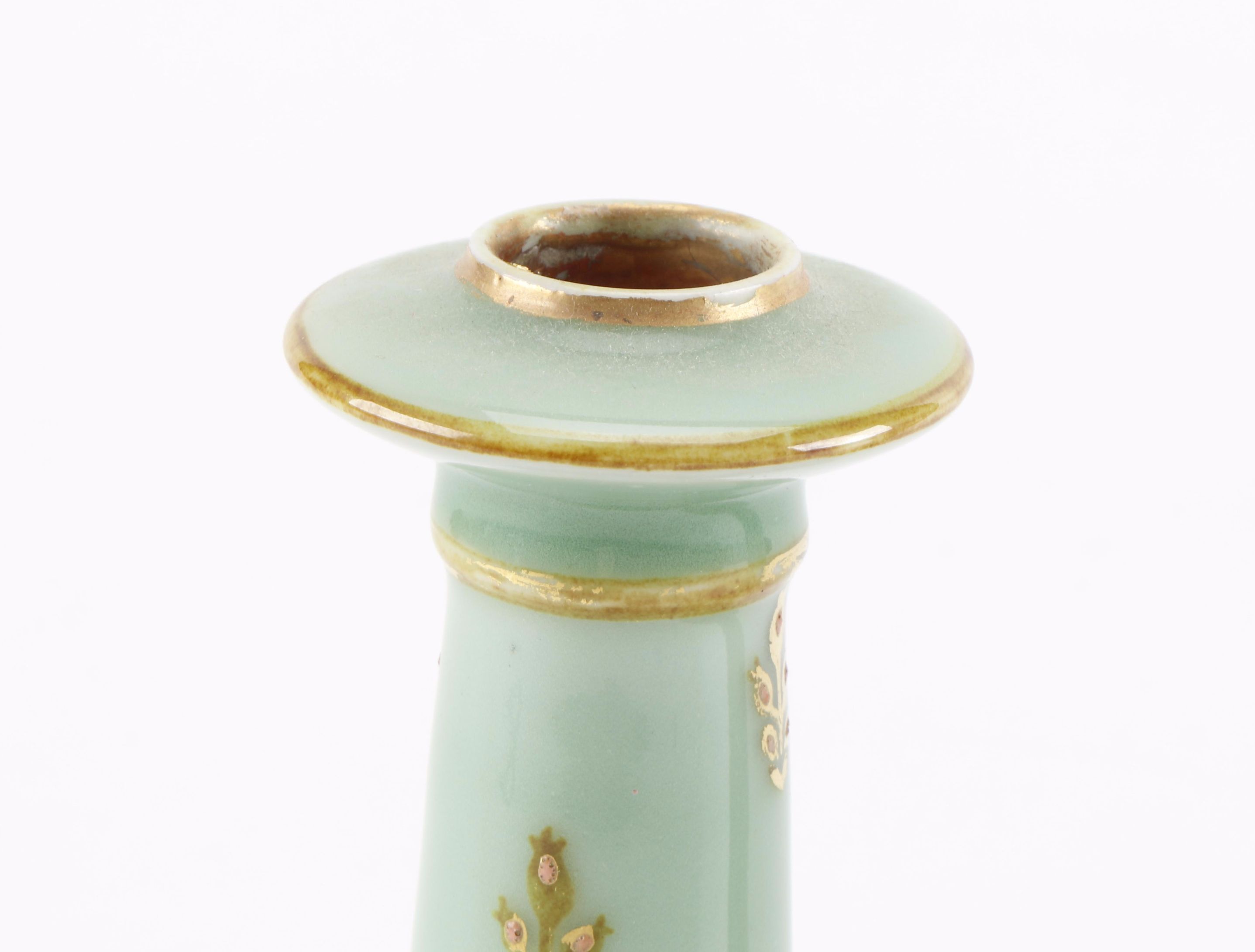 Pair of Green and Gold-Tone Ceramic Candlesticks