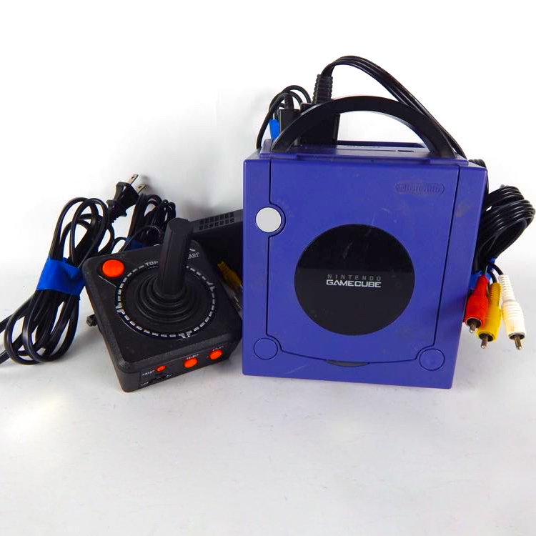 Nintendo Game Cube Console And Atari Joystick