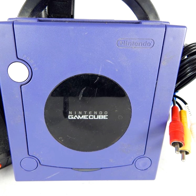 Nintendo Game Cube Console And Atari Joystick