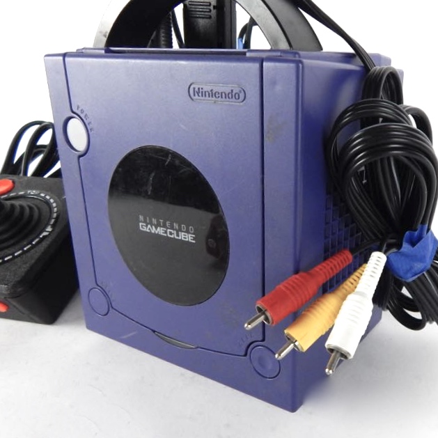 Nintendo Game Cube Console And Atari Joystick
