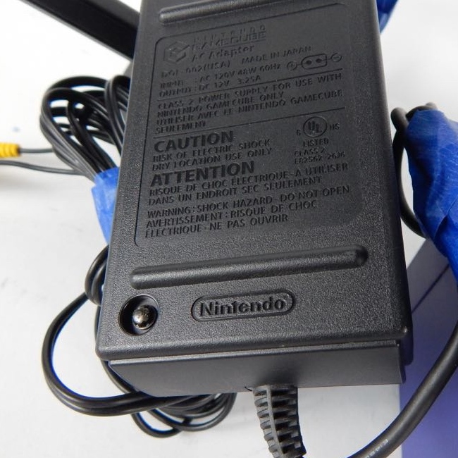 Nintendo Game Cube Console And Atari Joystick