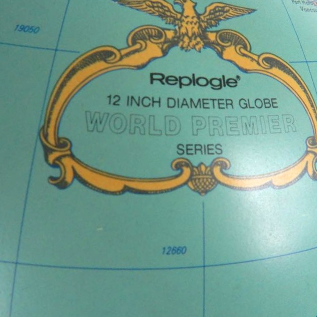 Vintage Side Table And Lighted Globe