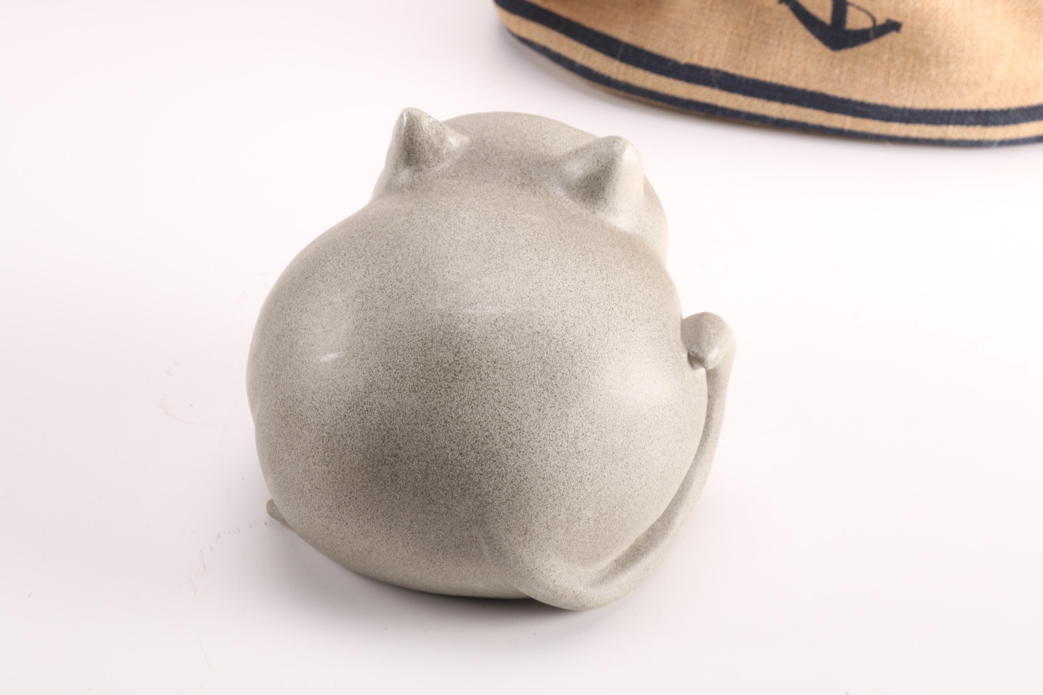 Cat Figure With Nesting Baskets and Decorative Plaques