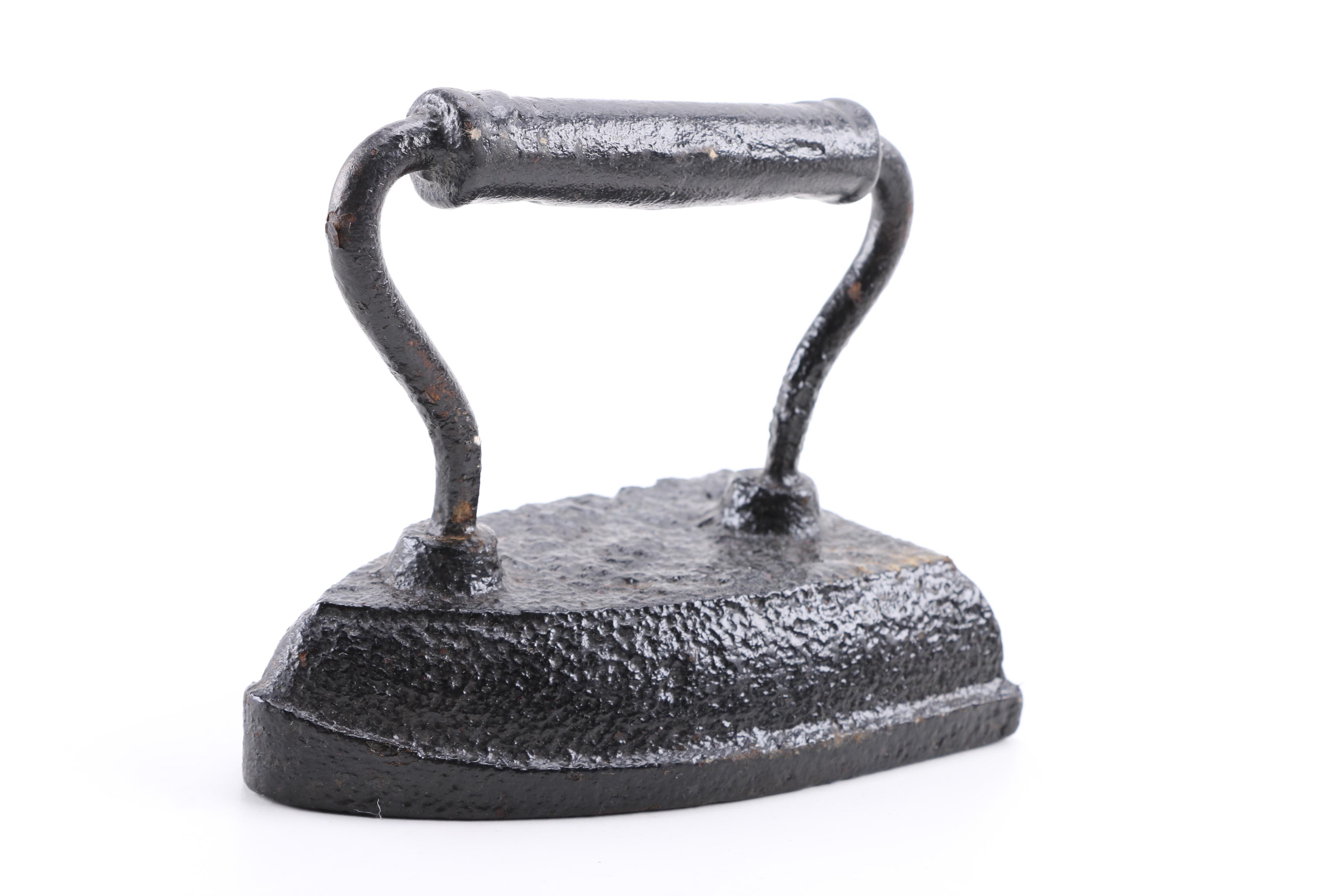 Pair of Early 20th Century Sad Irons and Acme "Midget" Stapler