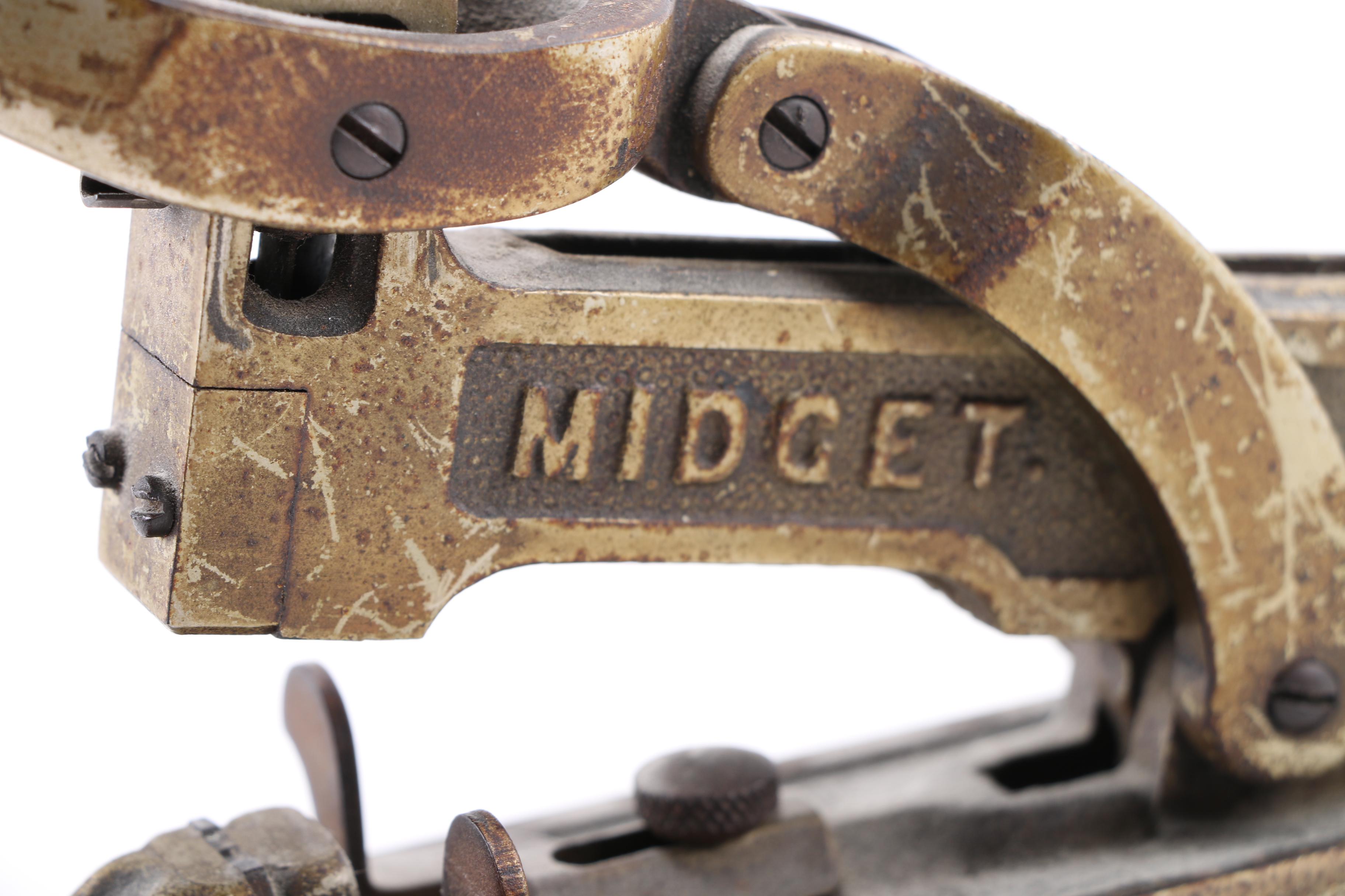 Pair of Early 20th Century Sad Irons and Acme "Midget" Stapler