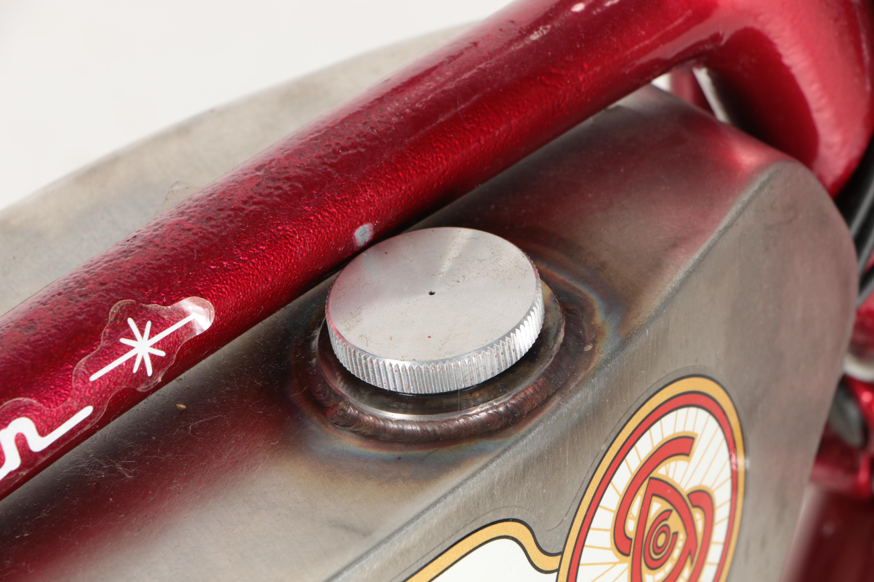 Red Schwinn Panther Motorized Bicycle