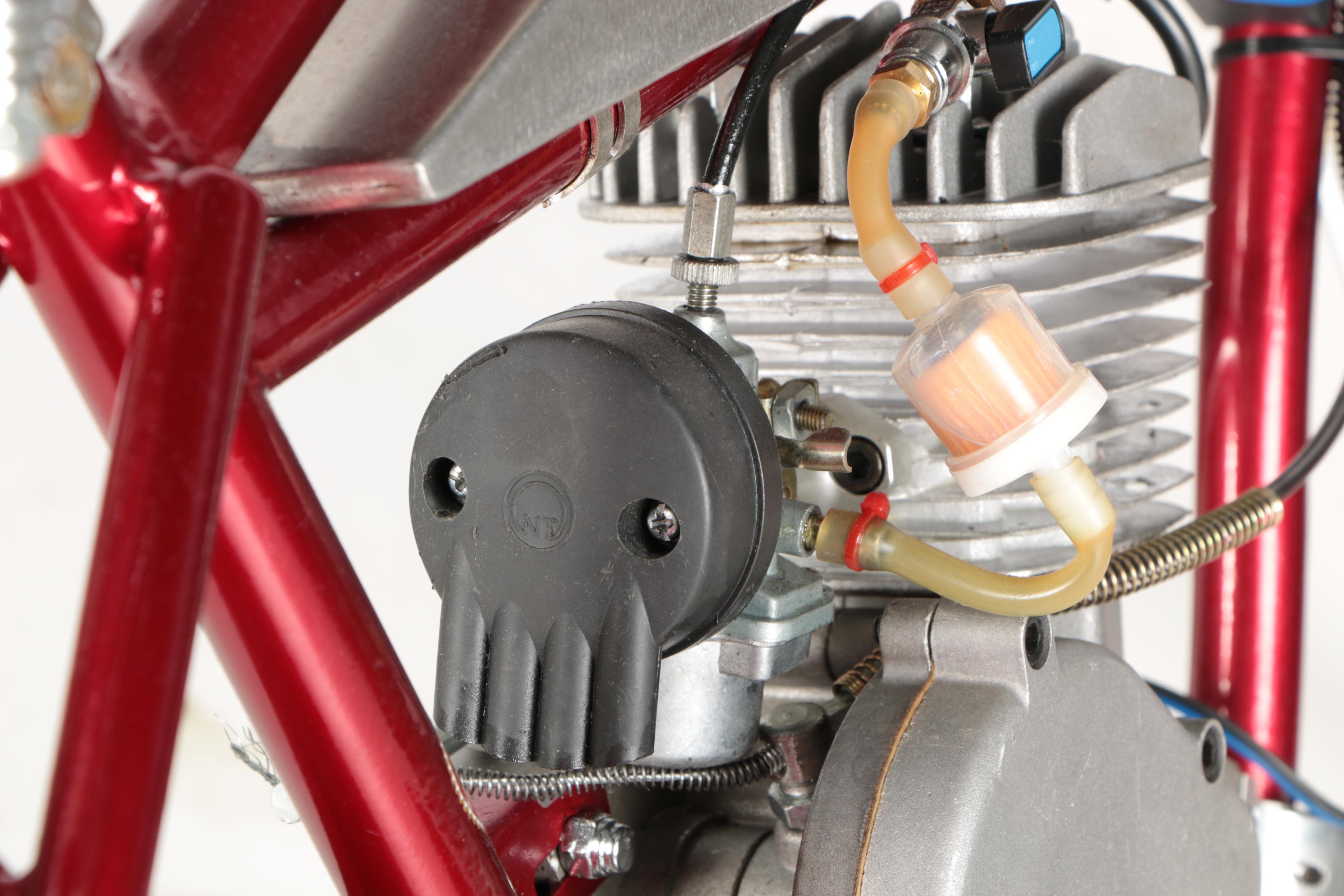 Red Schwinn Panther Motorized Bicycle