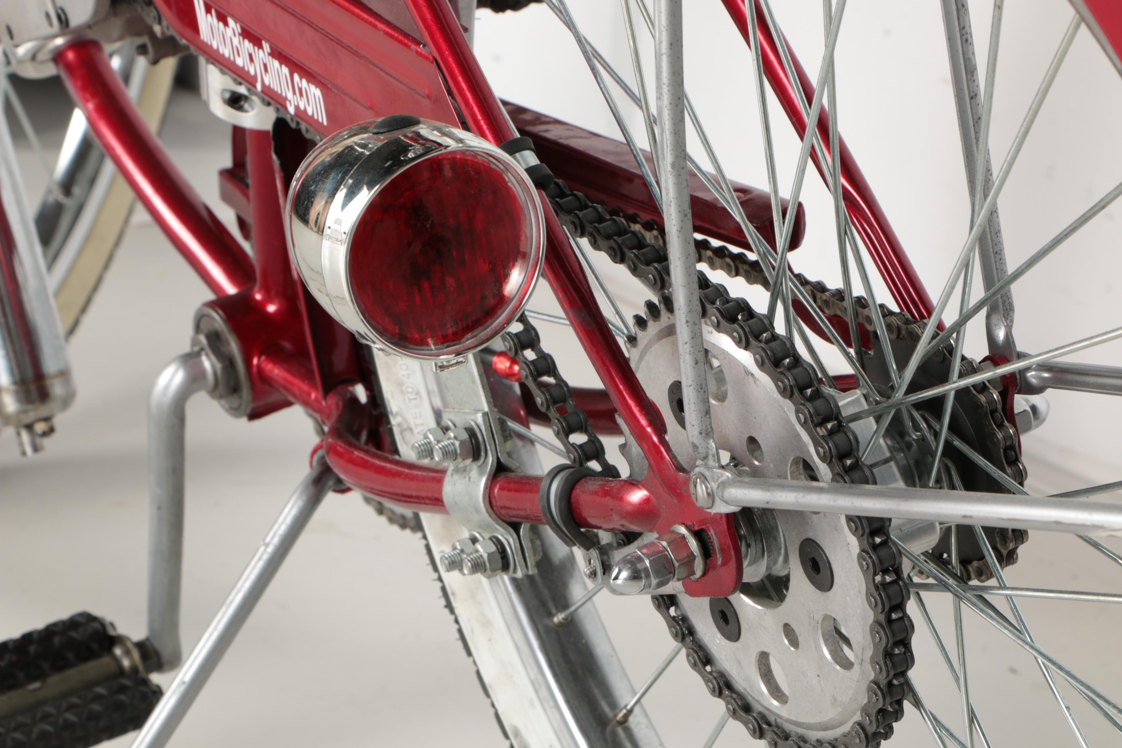 Red Schwinn Panther Motorized Bicycle