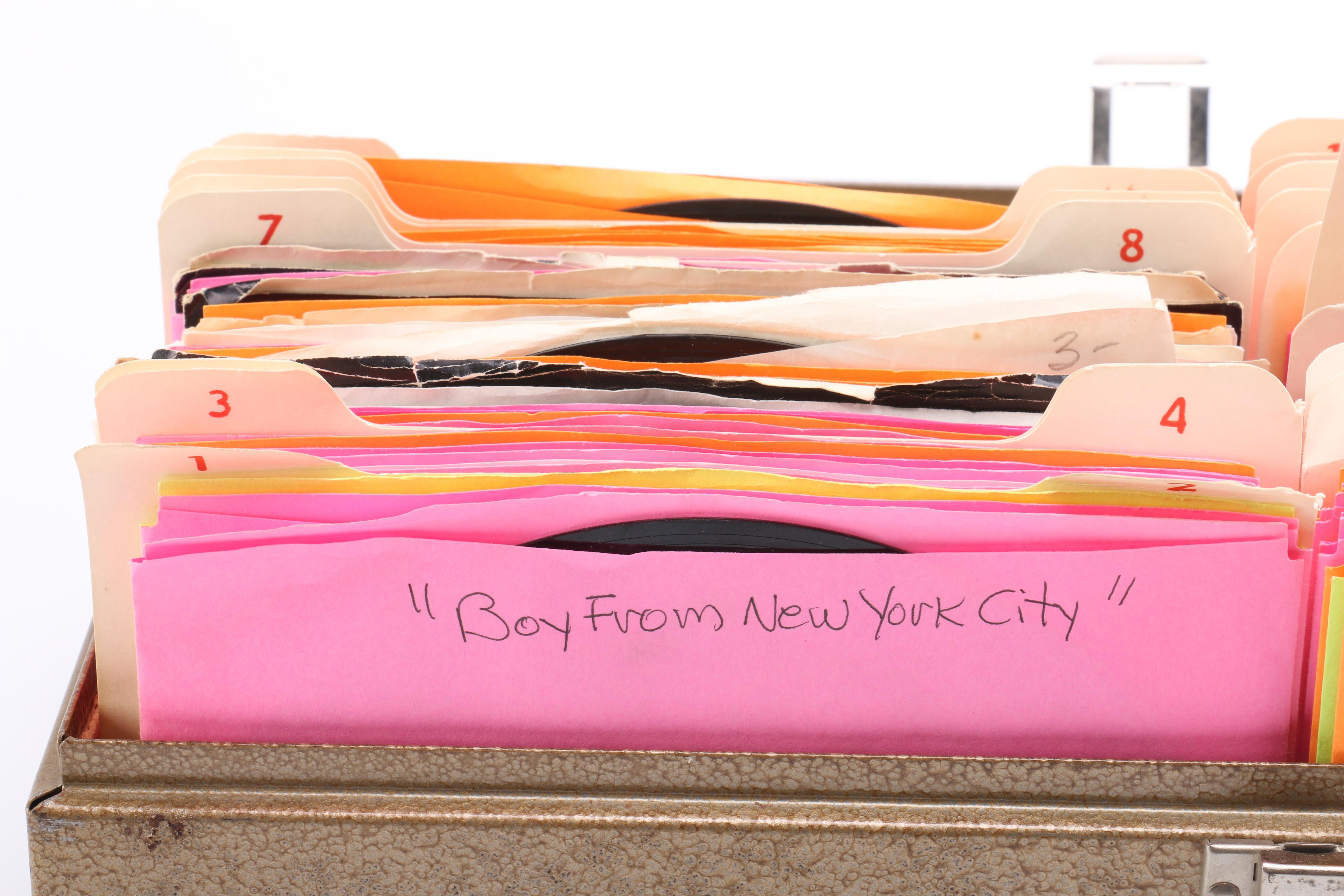 Collection of 45s in Metal Carrying Case