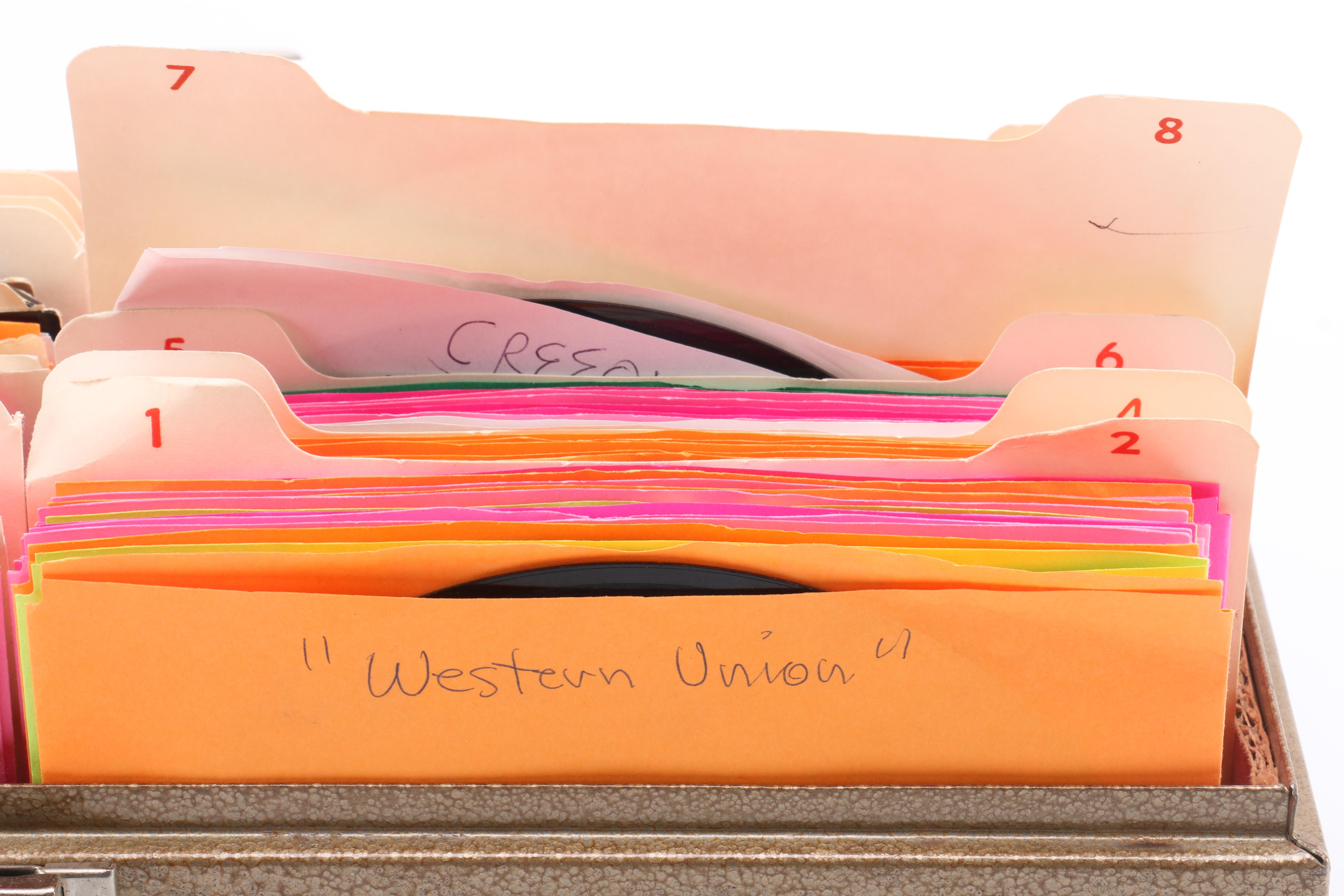 Collection of 45s in Metal Carrying Case