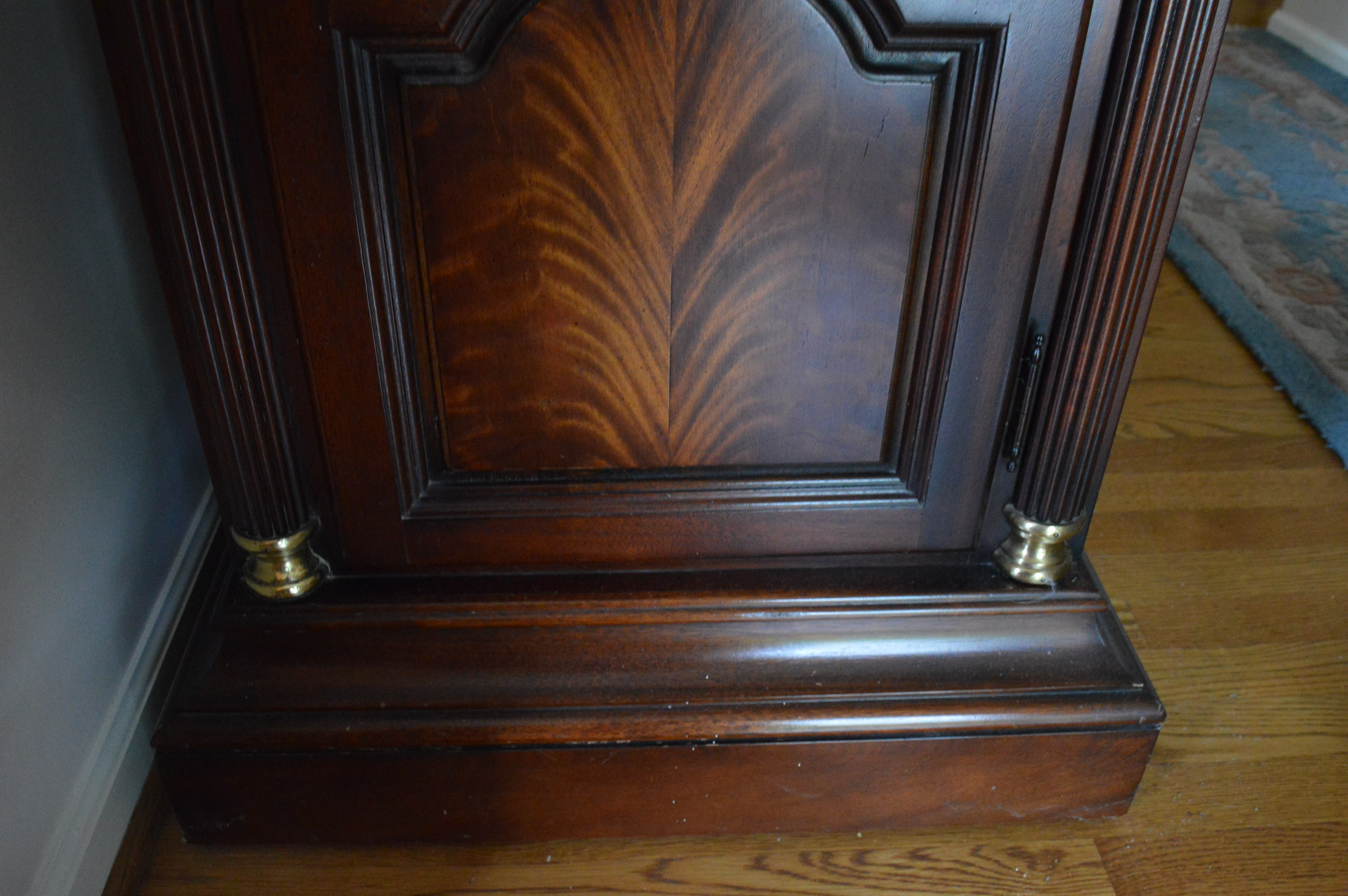 Queen Anne Style Mahogany Grandfather Clock by Howard Miller Clock Co.