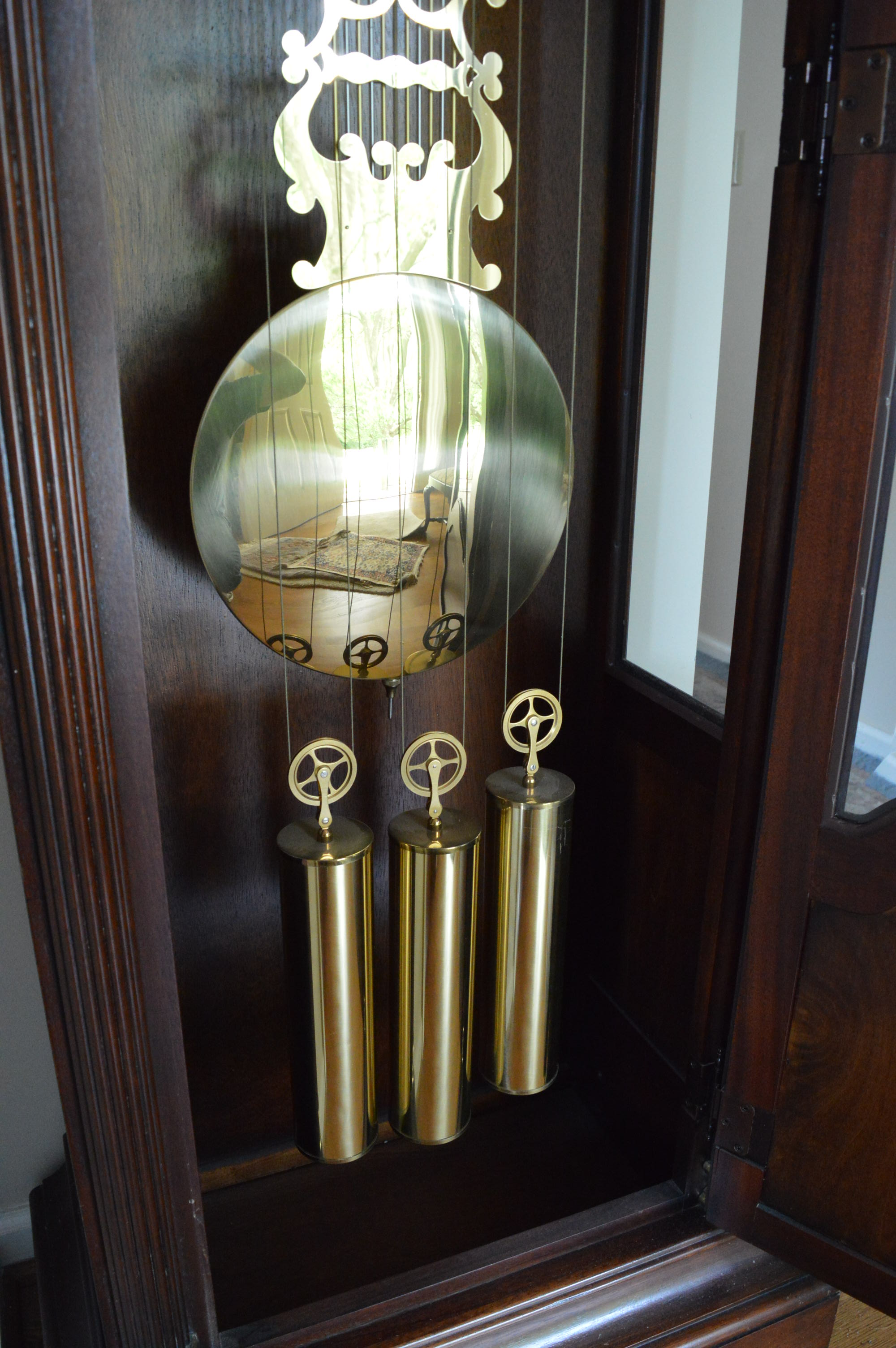 Queen Anne Style Mahogany Grandfather Clock by Howard Miller Clock Co.