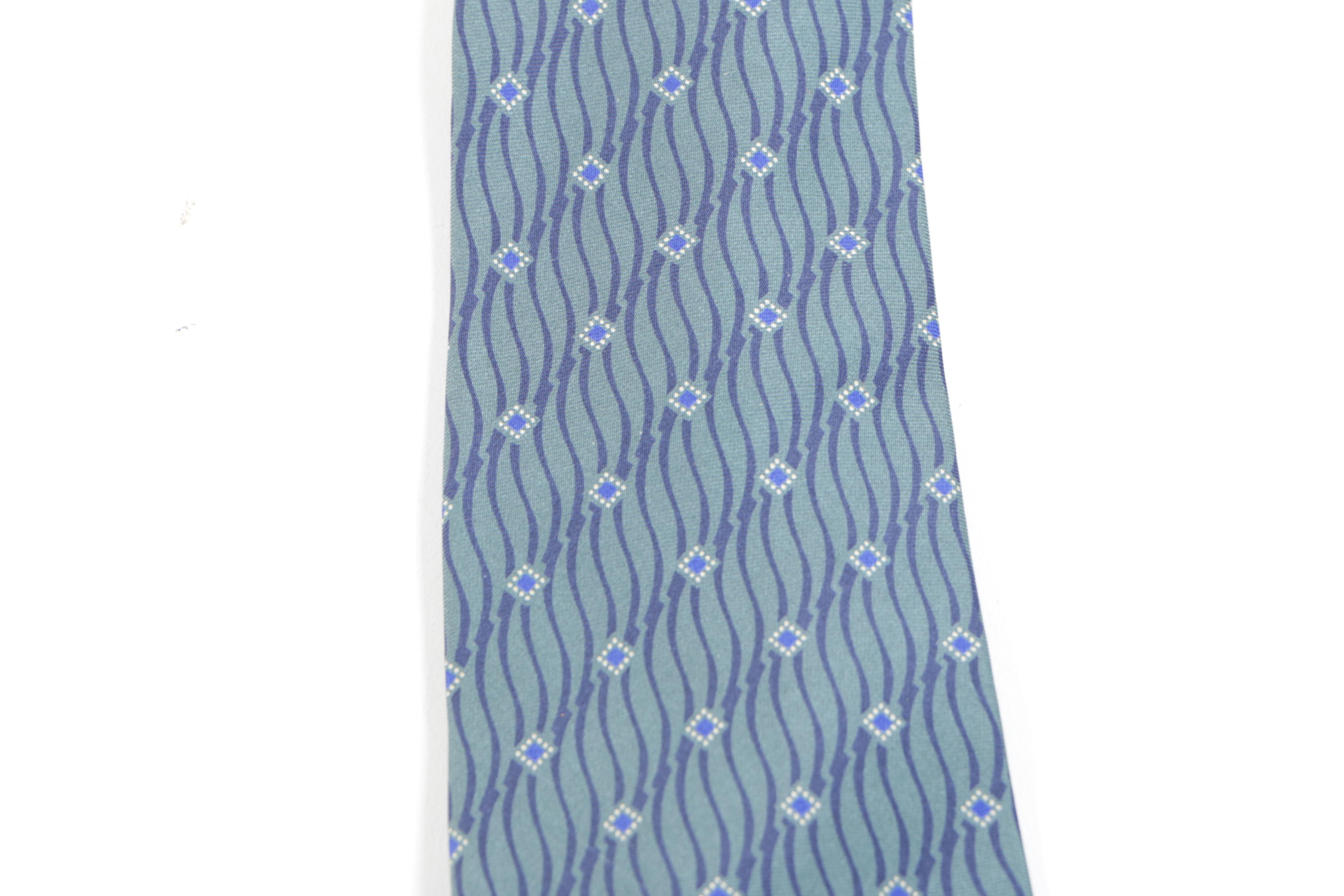 Neckties Including Valentino, Oscar de la Renta, and Beaufort